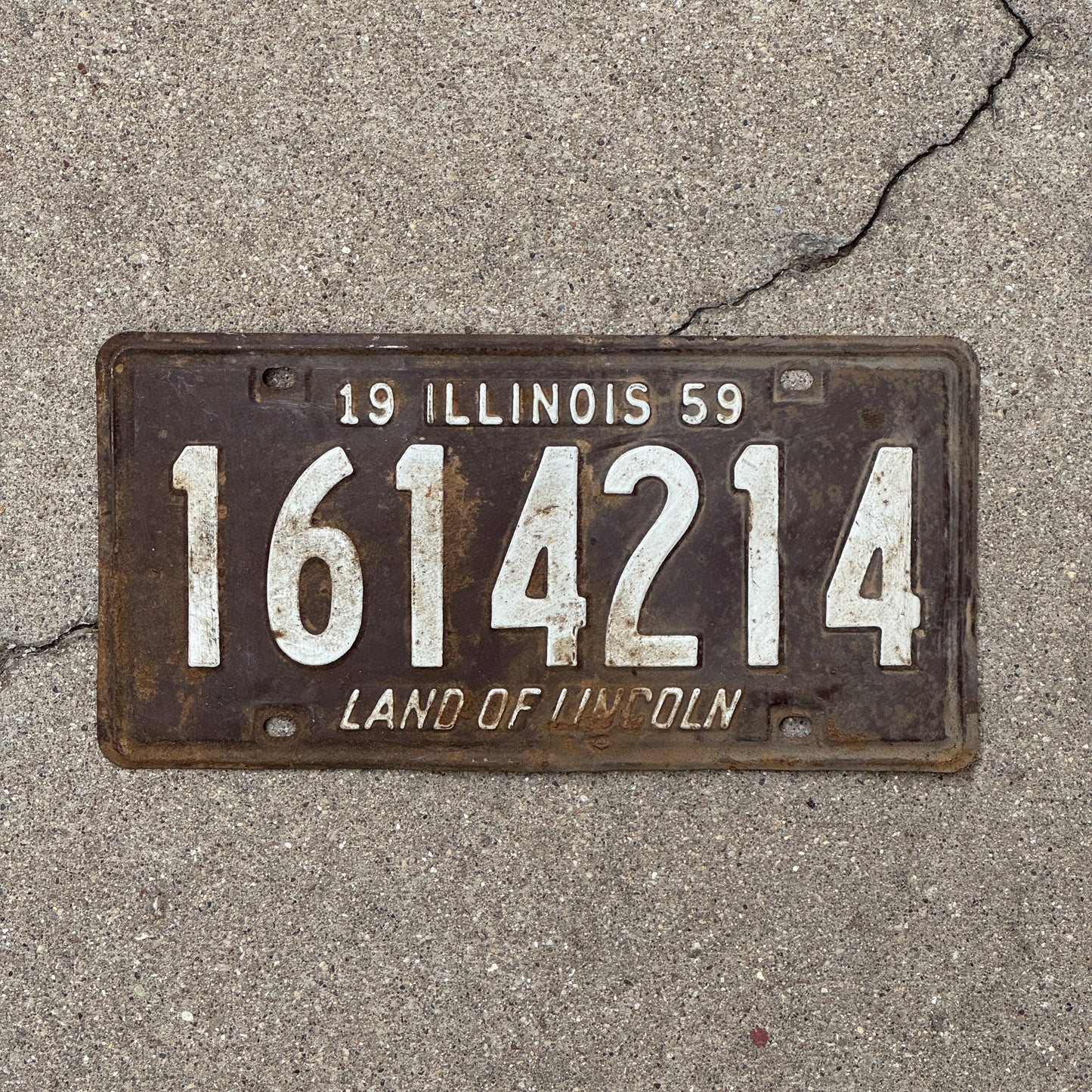 Photo of a 1959 Illinois License Plate Auto Tag Garage Decor Vintage 1 614 214 with original patina