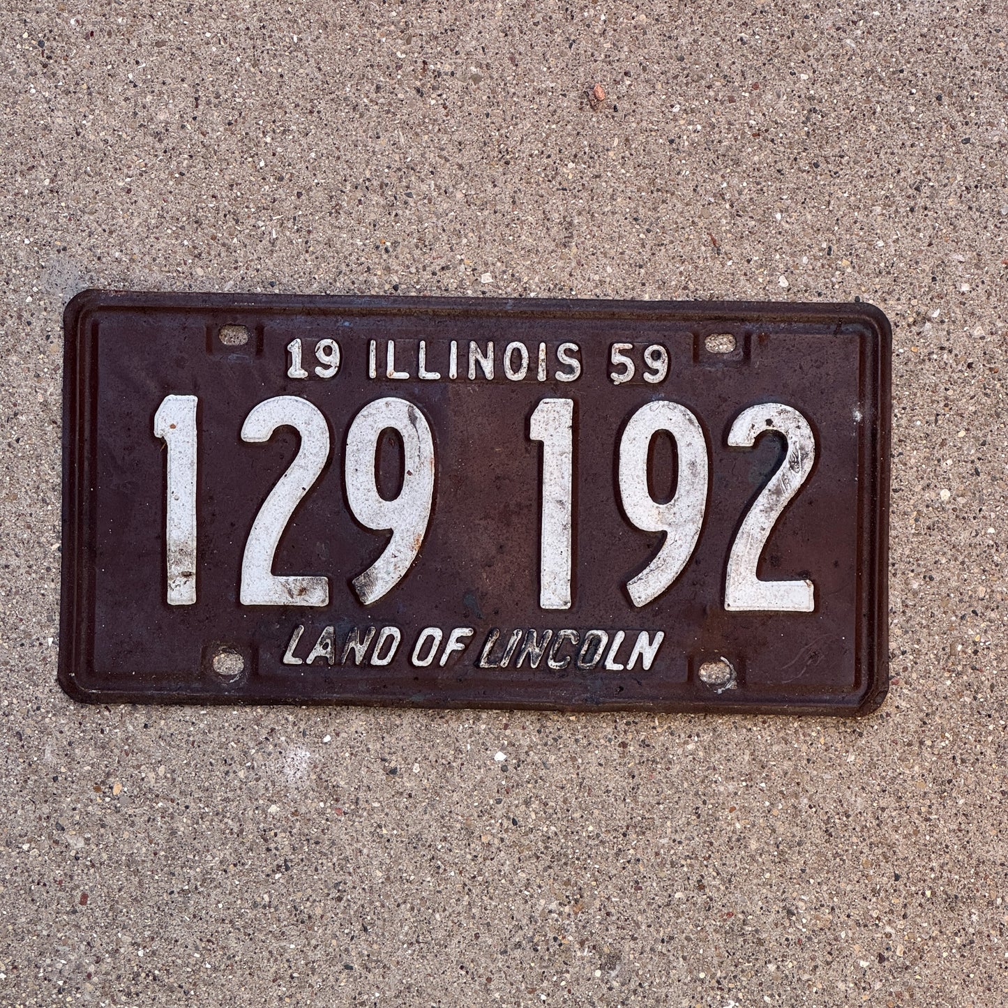 Photo of a 1959 Illinois License Plate Auto Tag Garage Decor Vintage 129 192 with original patina