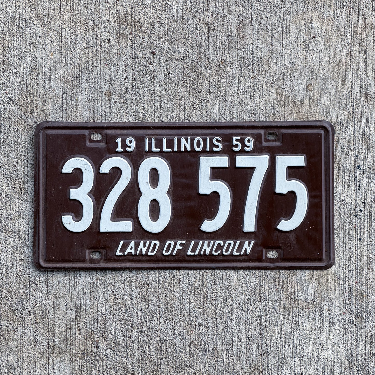 Photo of a 1959 Illinois License Plate Auto Tag Garage Decor Vintage 328 575 with original patina