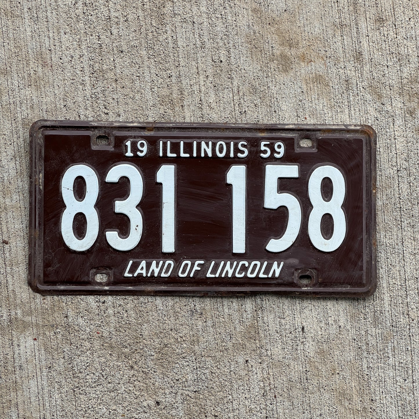 Photo of a 1959 Illinois License Plate Auto Tag Garage Decor Vintage 831 158 with original patina