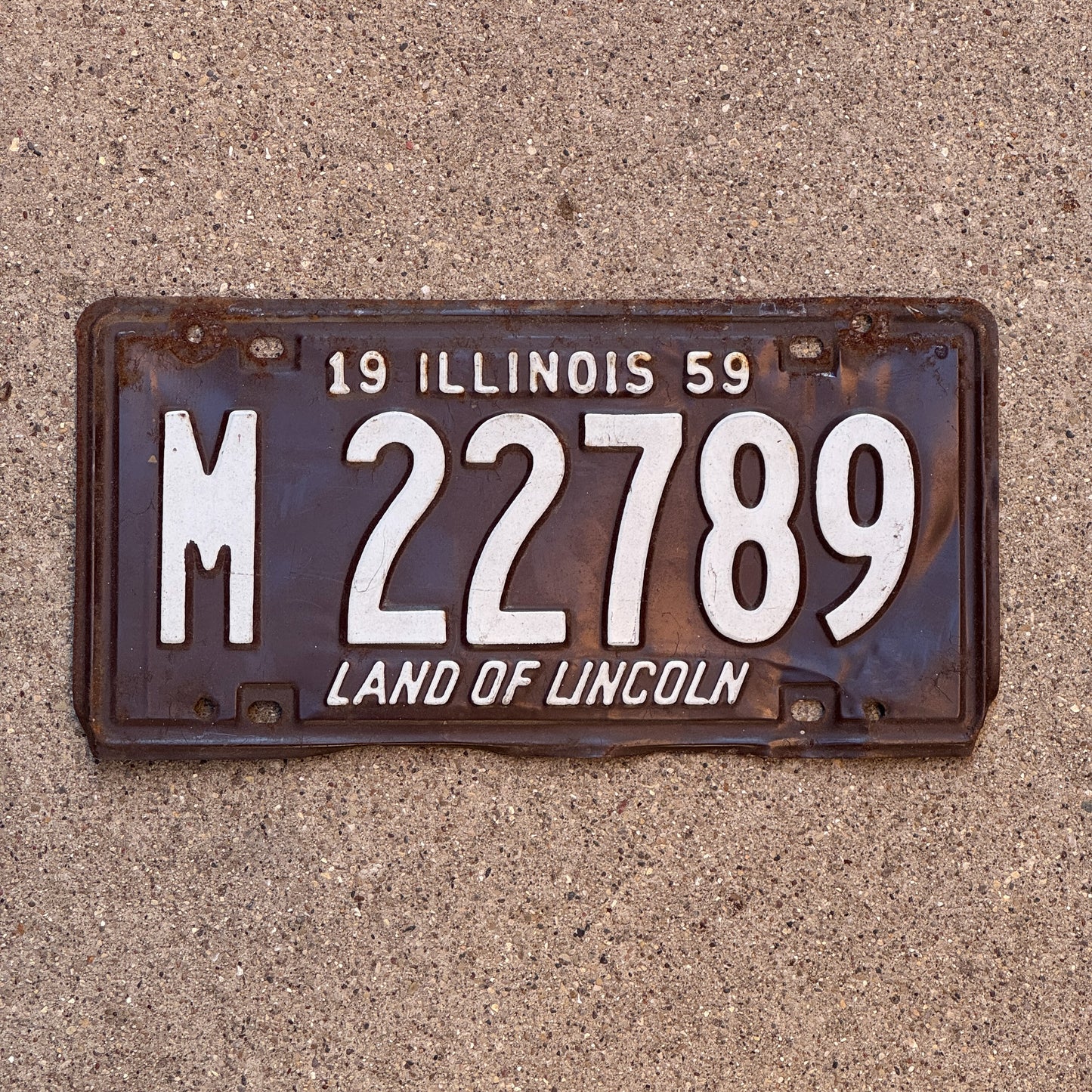 Photo of a 1959 Illinois Municipal License Plate Auto Tag Garage Decor Vintage M 22 789 with original patina