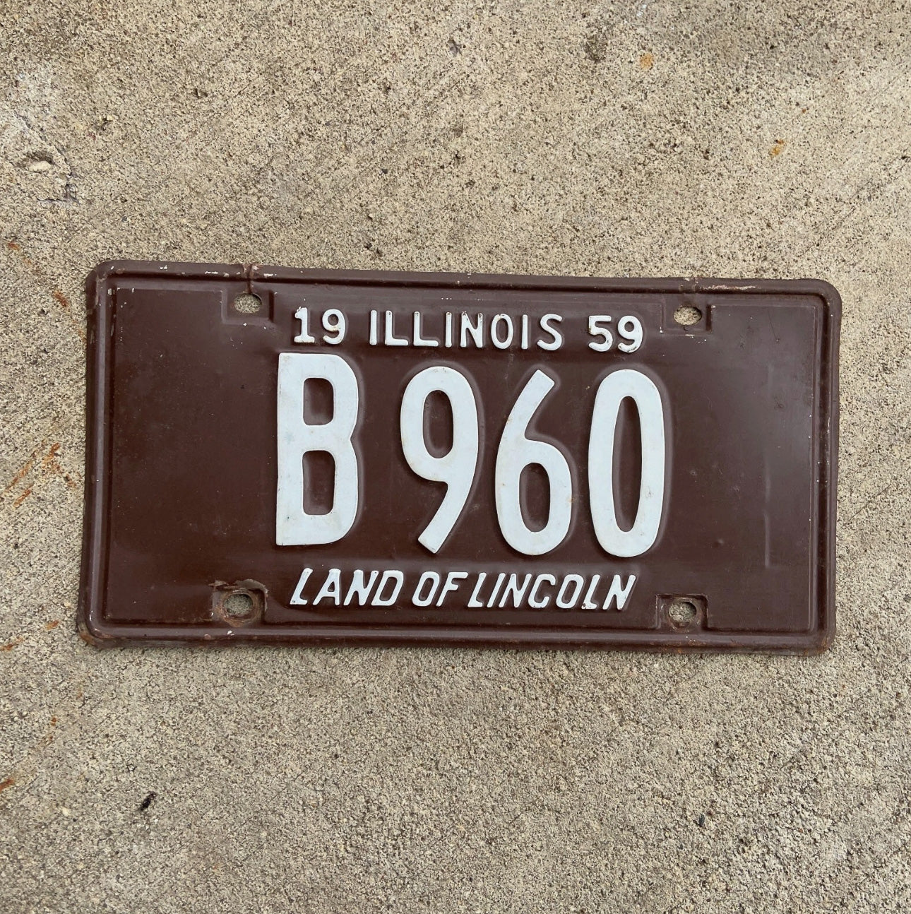 Photo of a 1959 Illinois Truck License Plate Auto Tag Garage Decor Vintage B 960 with original patina