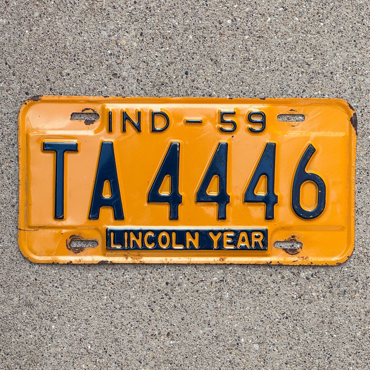 Photo of a 1959 Indiana License Plate Auto Tag Garage Decor Vintage Repeat Repeating TA 4446 with original patina