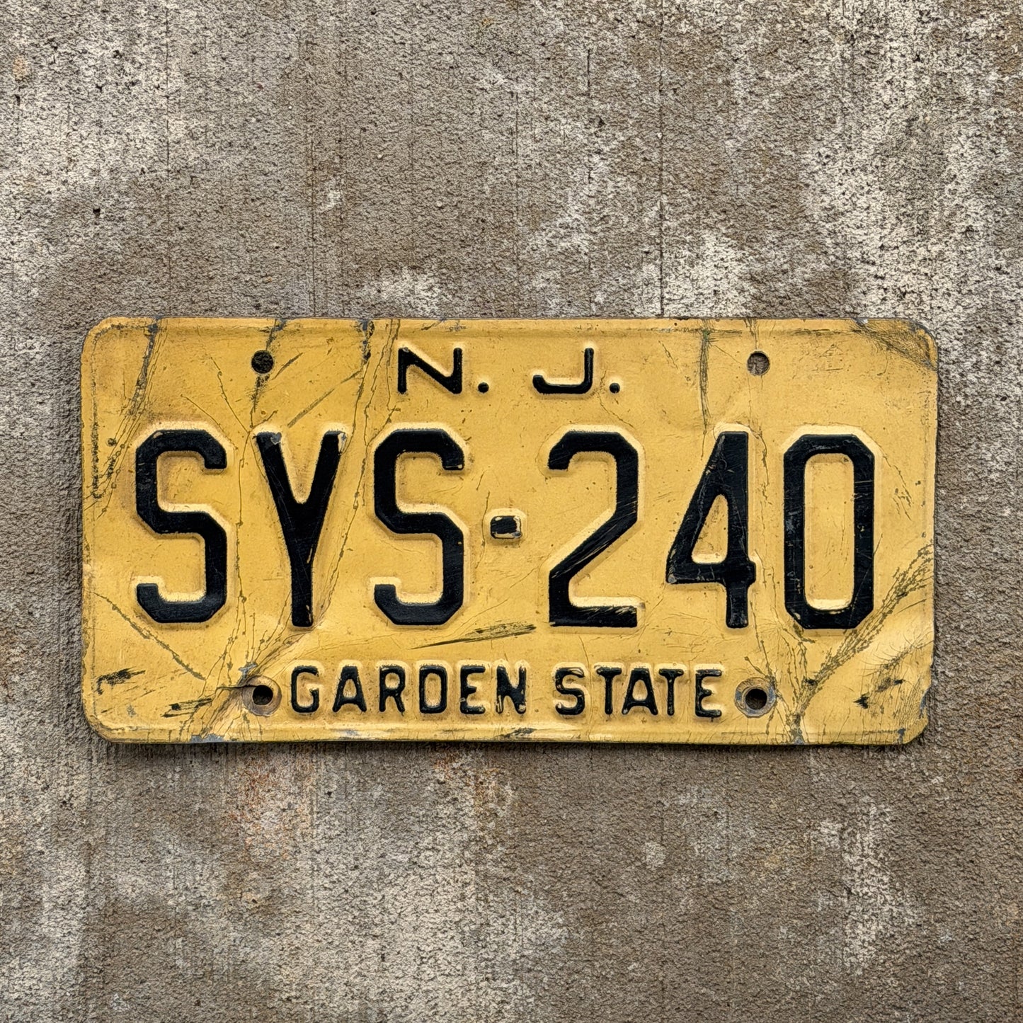 Photo of a 1959 New Jersey License Plate Auto Tag Garage Decor Vintage SYS 240 with original patina