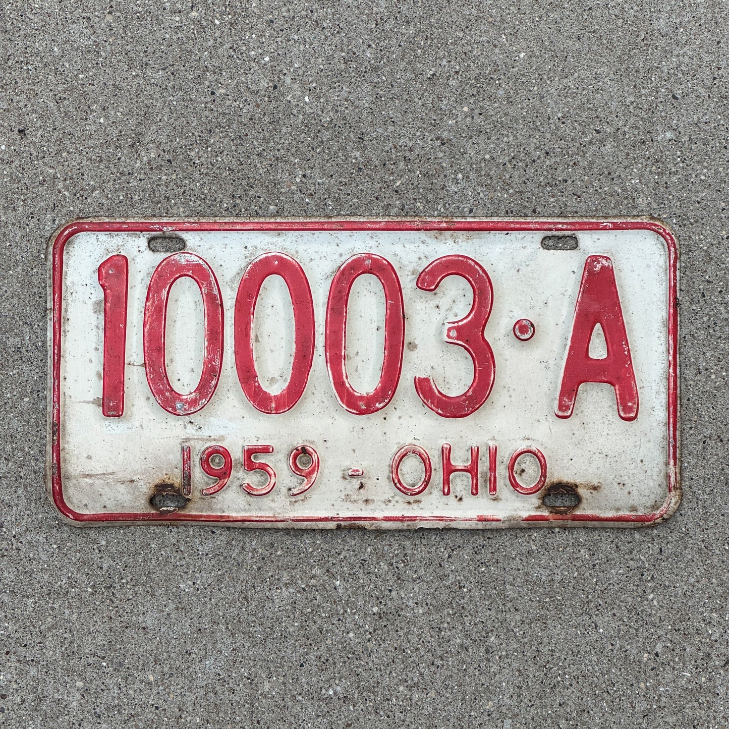 Photo of a 1959 Ohio License Plate Auto Tag Garage Decor Vintage 10003 A with original patina