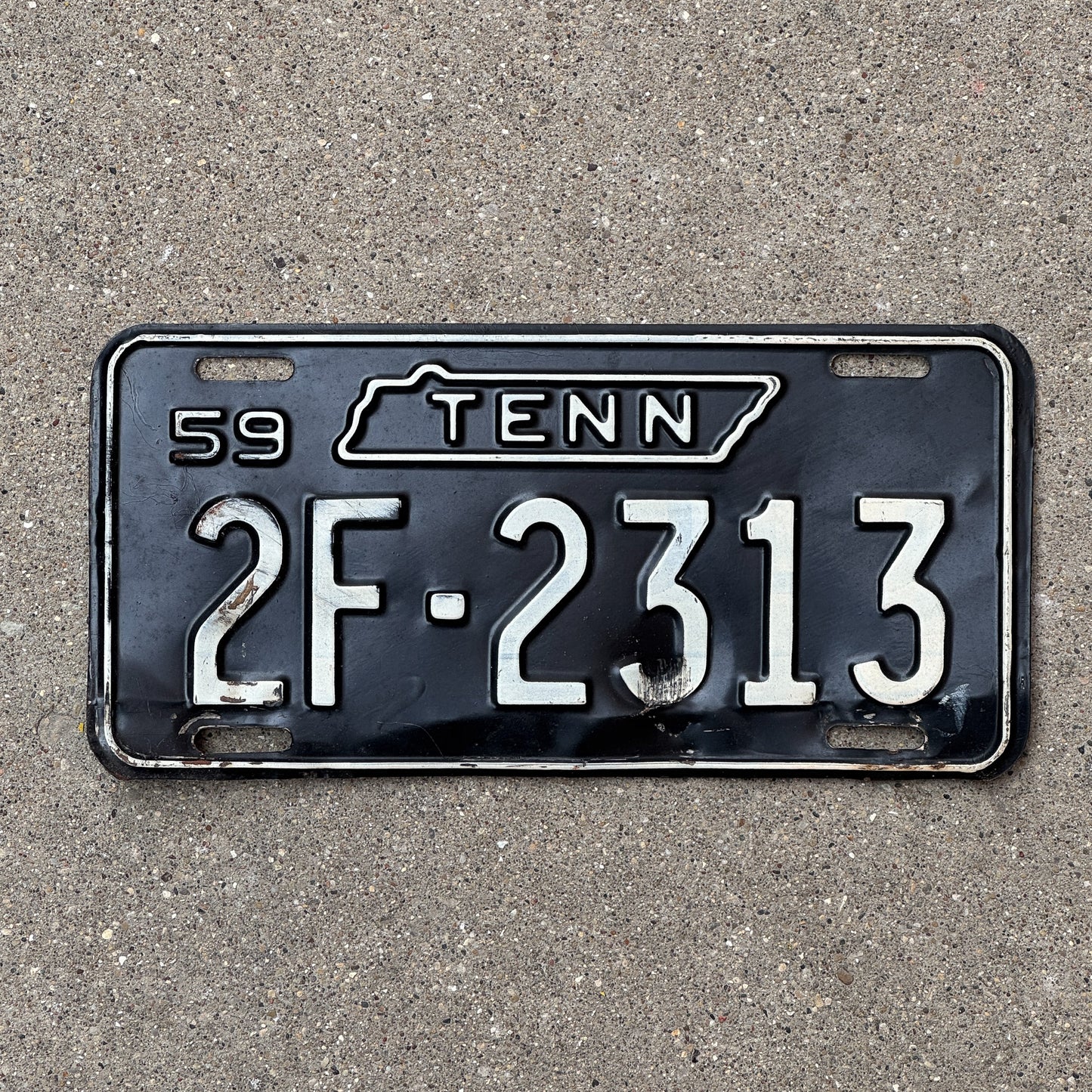 Photo of a 1959 Tennessee License Plate Auto Tag Garage Decor Vintage 2F 2313 with original patina