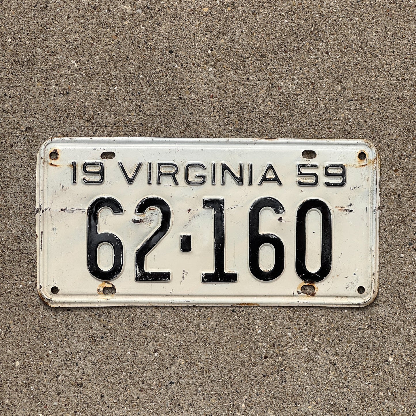 Photo of a 1959 Virginia License Plate Auto Tag Garage Decor Vintage 62 160