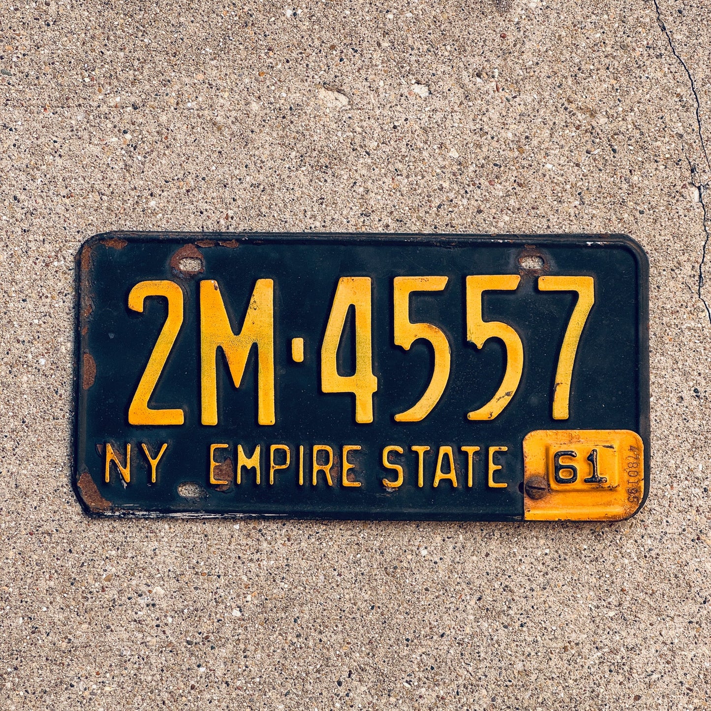 Photo of a 1960 1961 New York License Plate Auto Tag Garage Decor Vintage Empire State 2M 4557