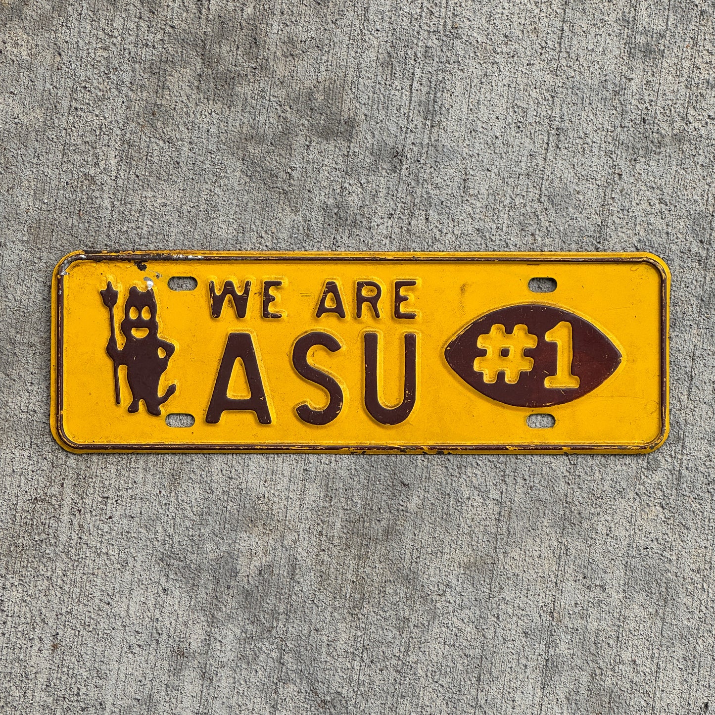 Photo of a 1960 Era Arizona State University ASU Arizona License Plate Topper Auto Tag Garage Decor Vintage Football College Sports with original patina