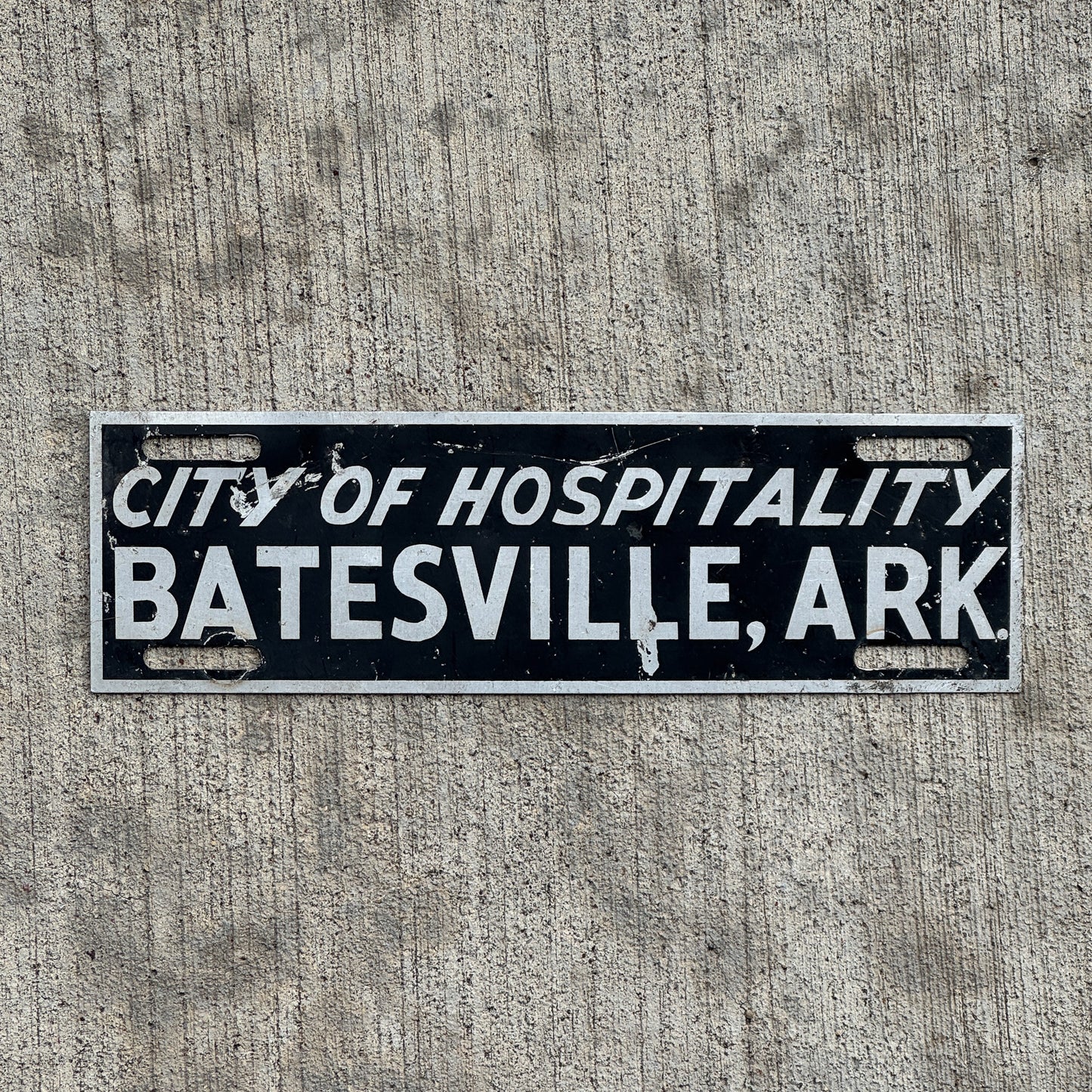 Photo of a 1960 Era Batesville Arkansas License Plate Topper Auto Tag Garage Decor Vintage with original patina