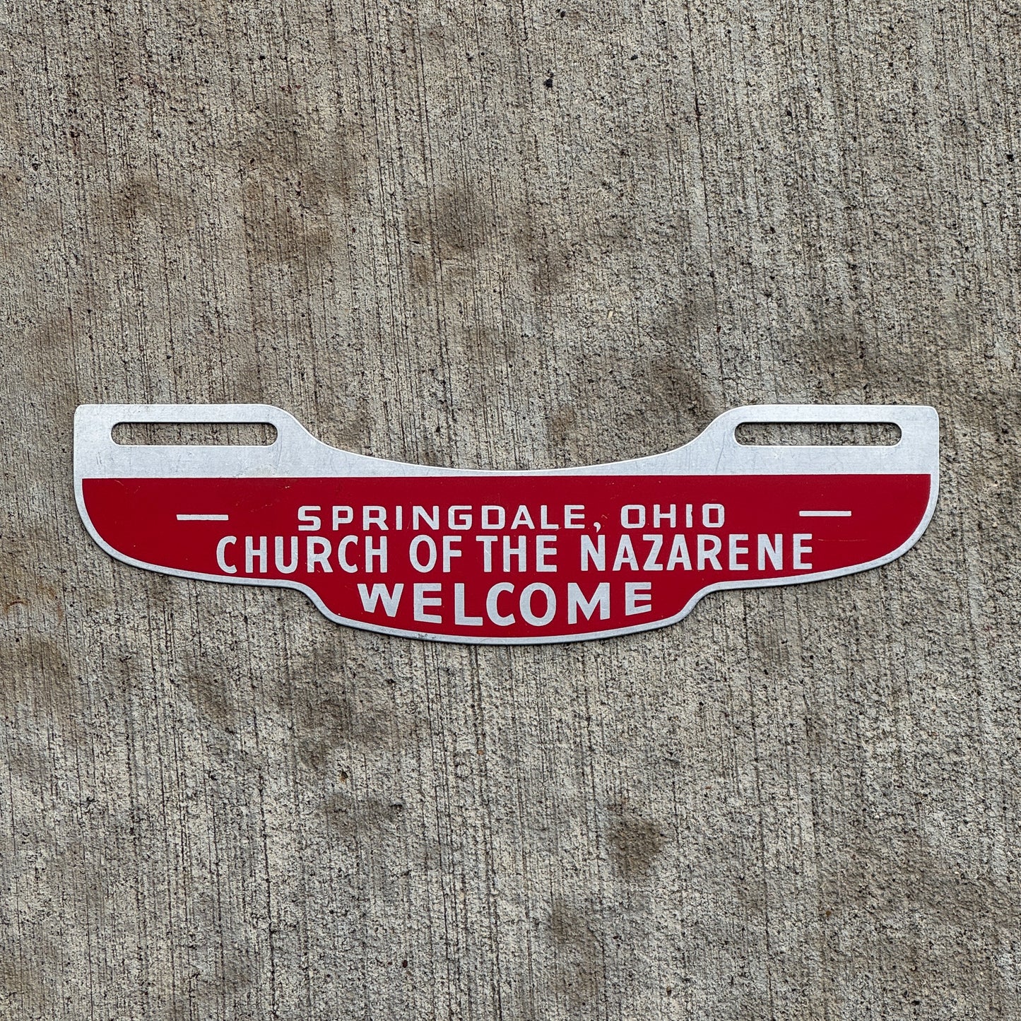 Photo of a 1960 Era Church of Nazarene Springdale Ohio License Plate Topper Auto Tag Garage Decor Vintage Springfield OH with original patina