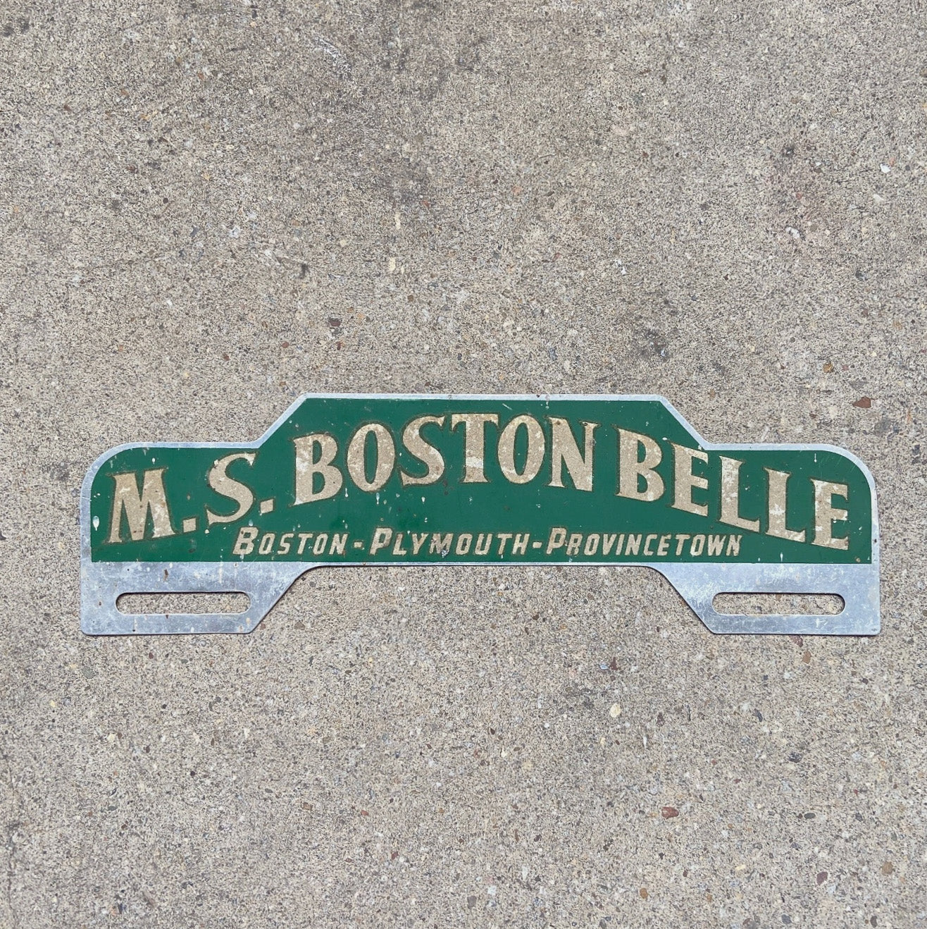 Photo of a 1960 Era MS Boston Belle Massachusetts License Plate Topper Auto Tag Garage Decor Vintage Ship Boat Plymouth with original patina