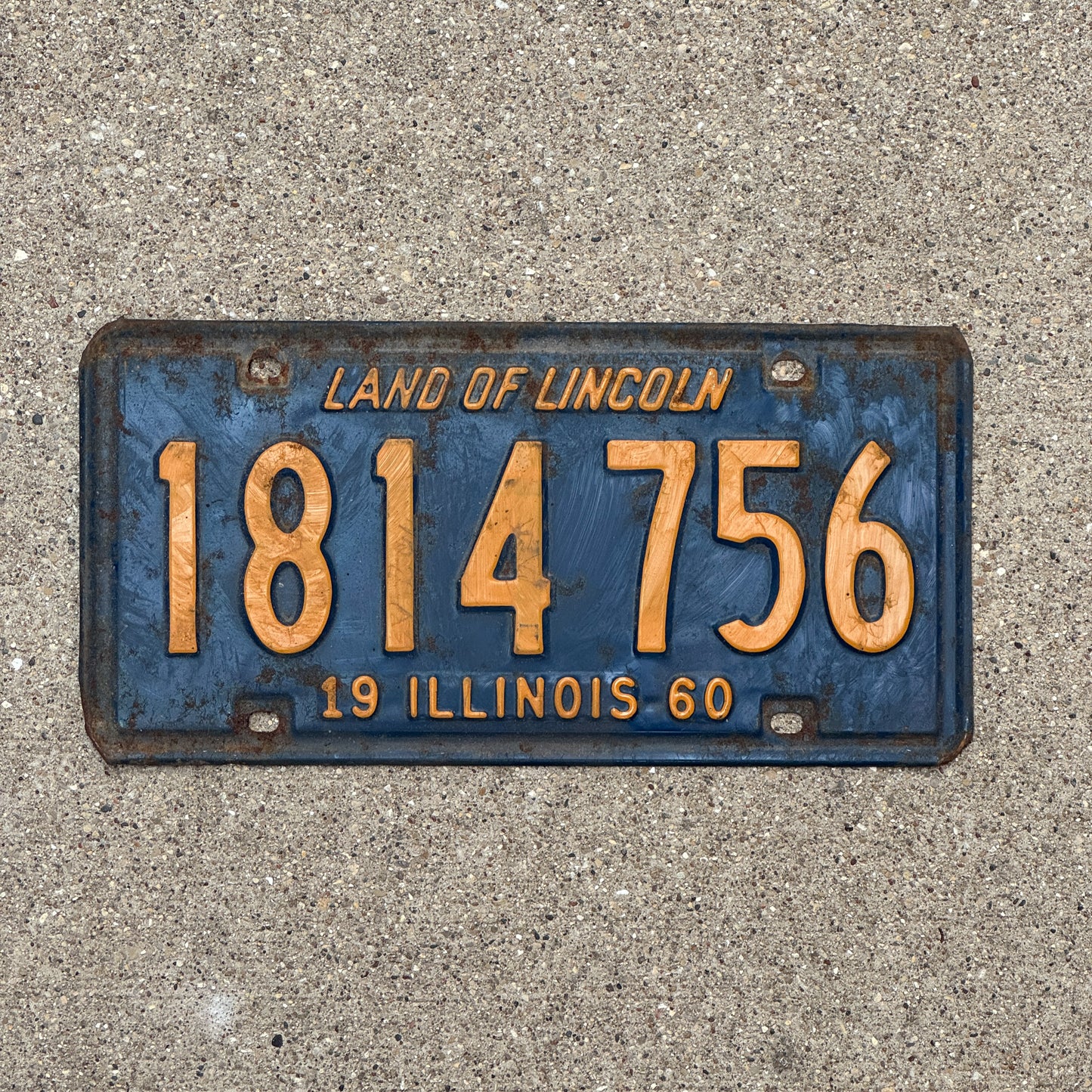 Photo of a 1960 Illinois License Plate Auto Tag 1 Vintage Garage Orange Blue 1 814 756 with original patina