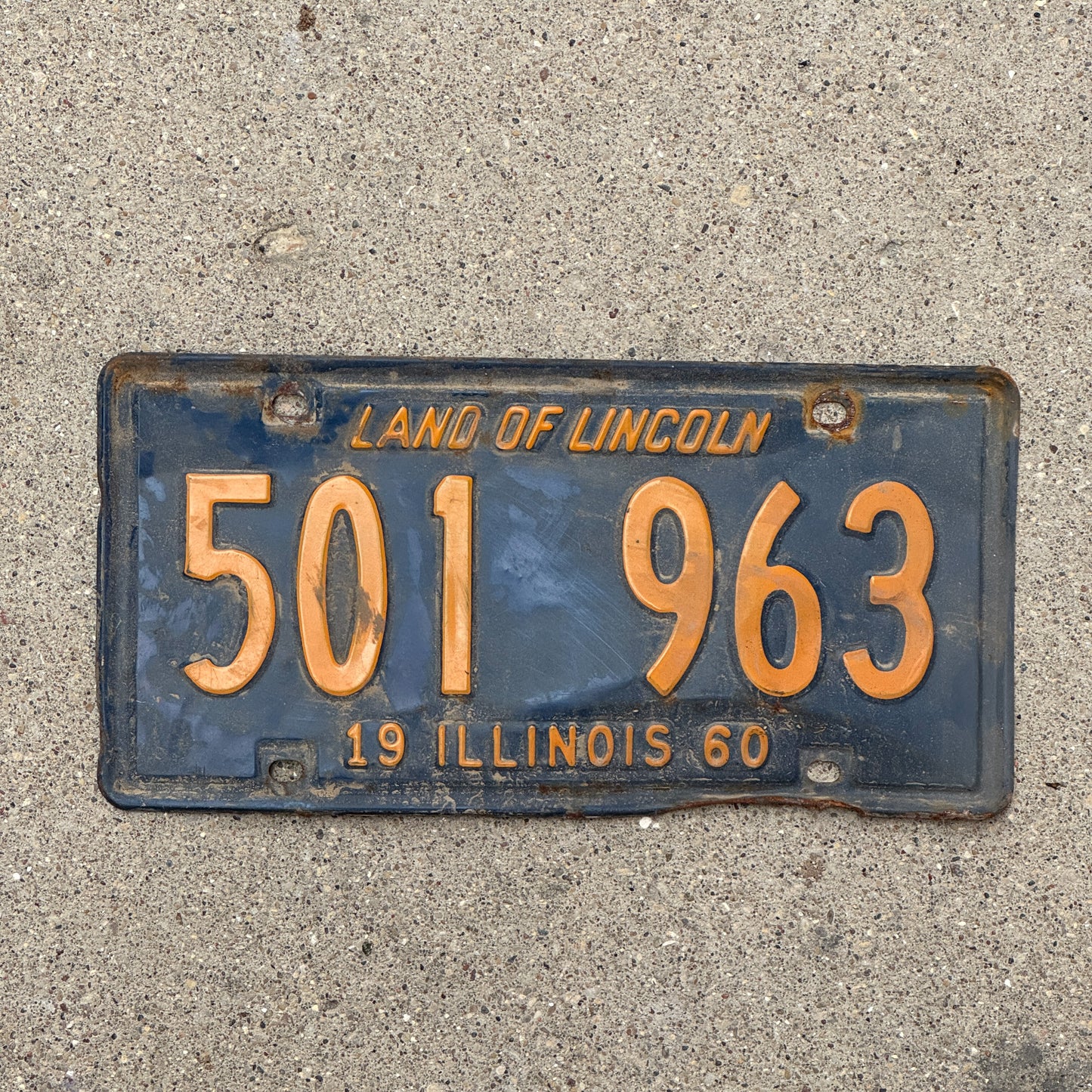 Photo of a 1960 Illinois License Plate Auto Tag 1 Vintage Garage Orange Blue 501 963 with original patina