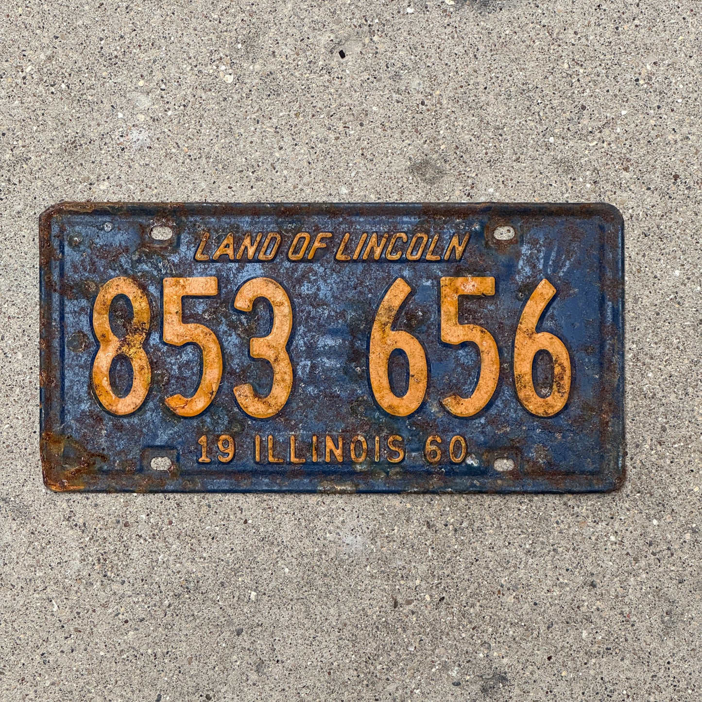 Photo of a 1960 Illinois License Plate Auto Tag 1 Vintage Garage Orange Blue 853 656 with original patina