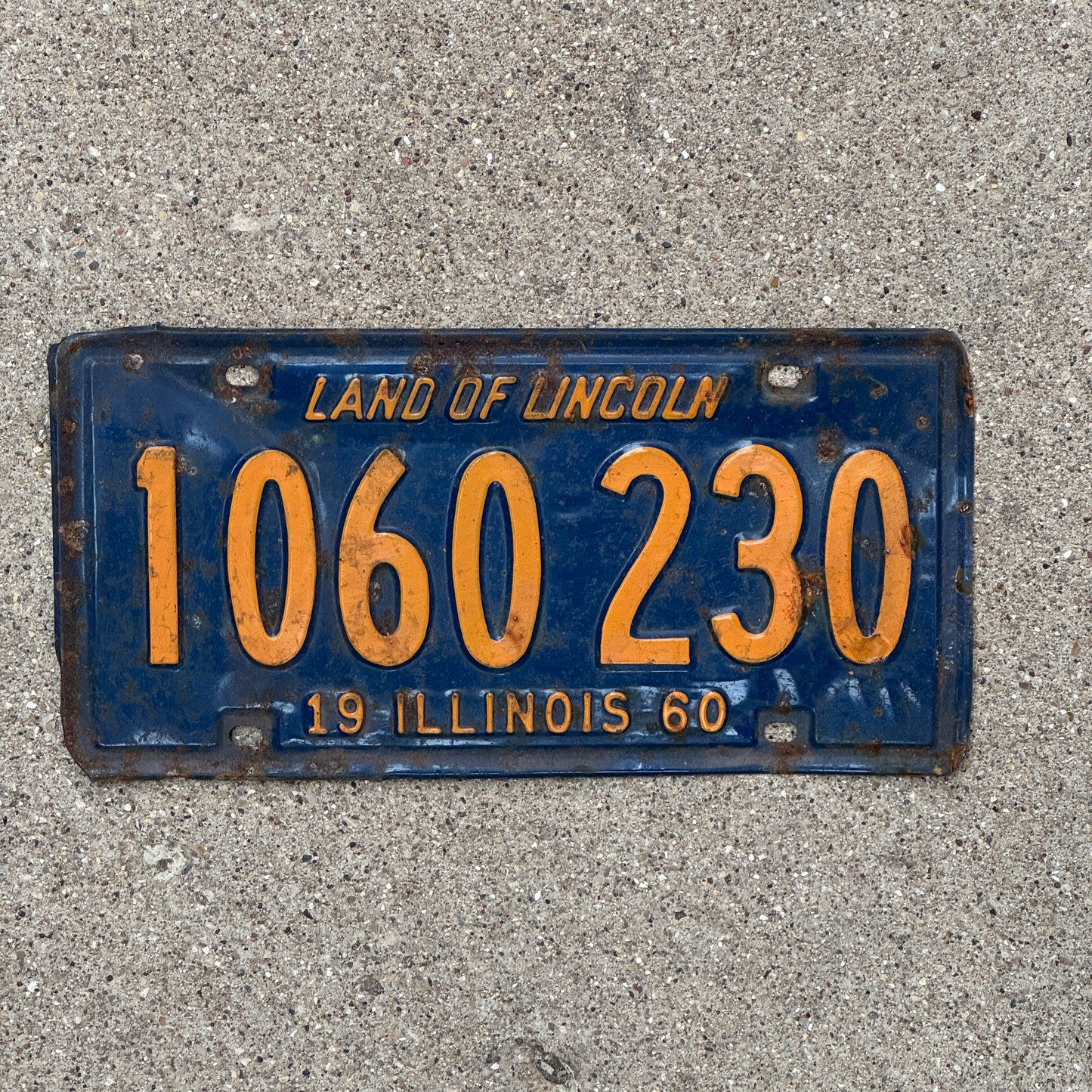 Photo of a 1960 Illinois License Plate Auto Tag 2 Vintage Garage Orange Blue 1 060 230 with original patina