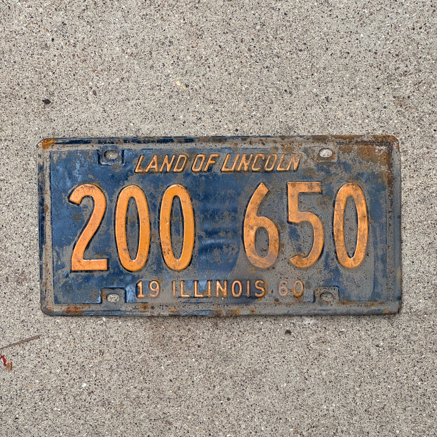 Photo of a 1960 Illinois License Plate Auto Tag 2 Vintage Garage Orange Blue 200 650 with original patina