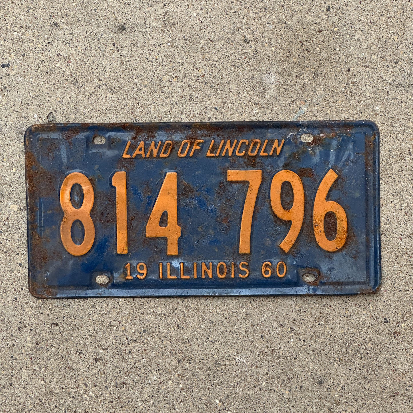 Photo of a 1960 Illinois License Plate Auto Tag 2 Vintage Garage Orange Blue 814 796 with original patina