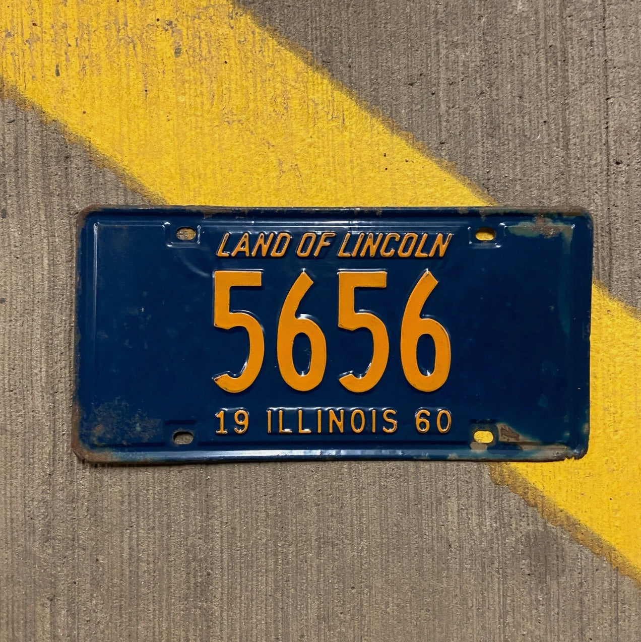 Photo of a 1960 Illinois License Plate Auto Tag Garage Decor Vintage Low Number Four Digit 5656 with original patina