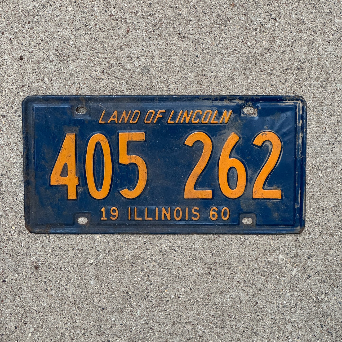 Photo of a 1960 Illinois License Plate Auto Tag Garage Decor Vintage Orange Blue 405 262 with original patina
