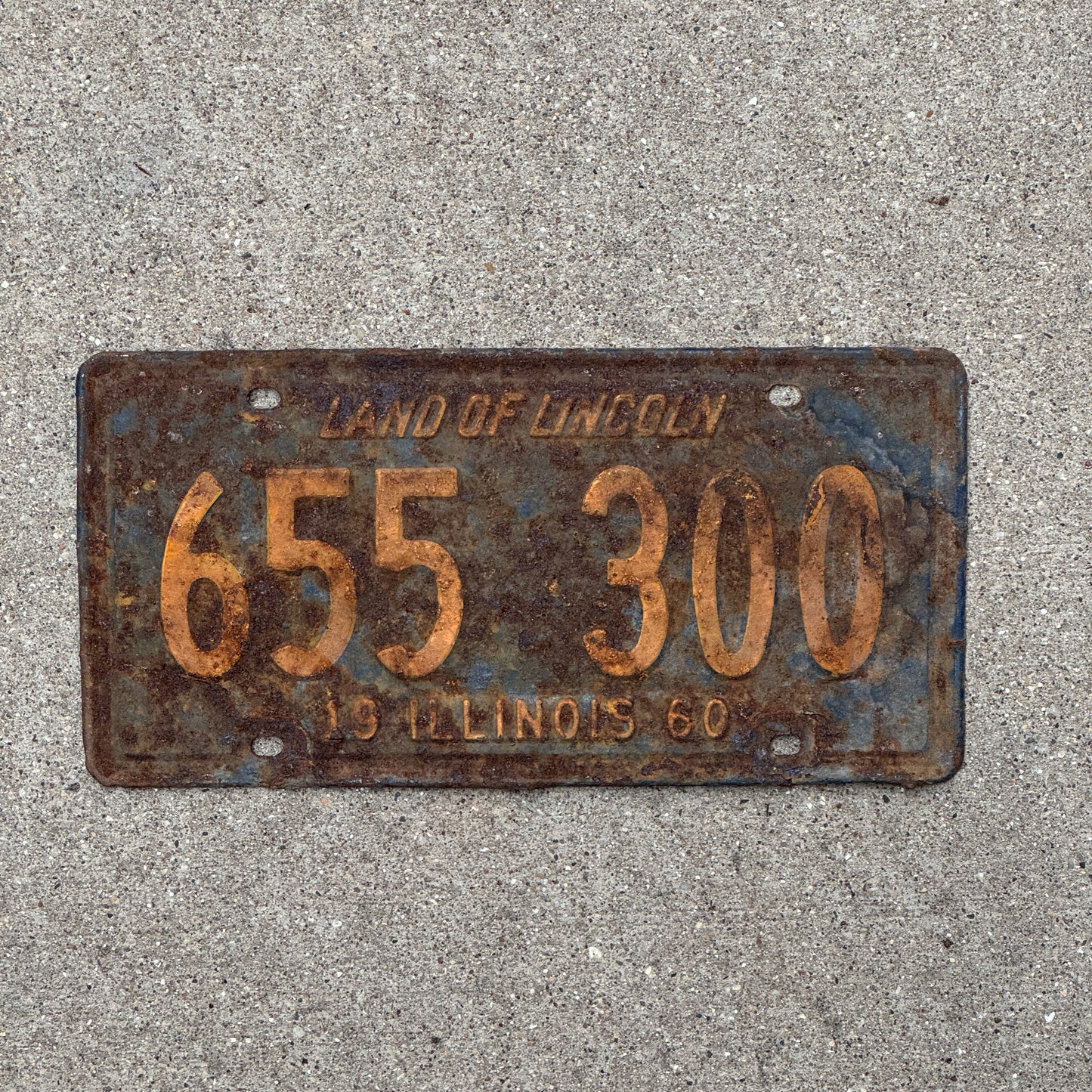 Photo of a 1960 Illinois License Plate Auto Tag Garage Decor Vintage Orange Blue 655 300 with original patina