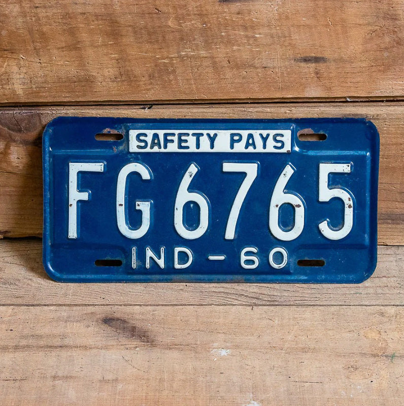 Photo of a 1960 Indiana License Plate Auto Tag Garage Decor Vintage FG 6765 with original patina
