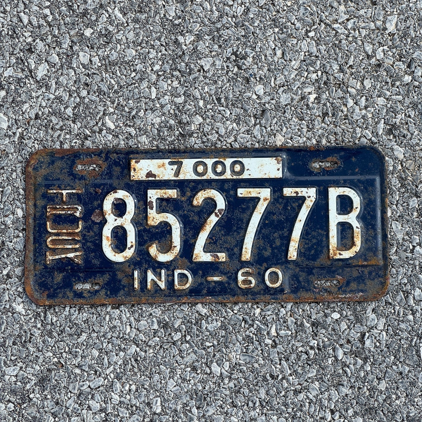 Photo of a 1960 Indiana Truck License Plate Auto Tag Garage Decor Vintage 85277B