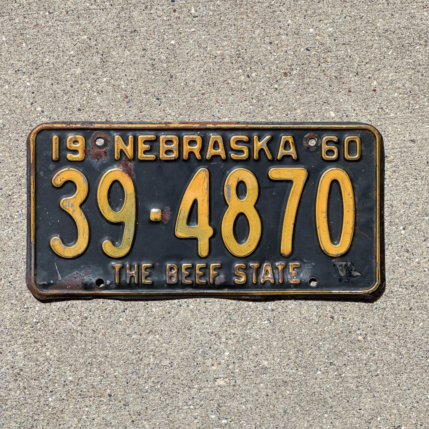 Photo of a 1960 Nebraska License Plate Auto Tag Garage Decor Vintage 39 4870 with original patina