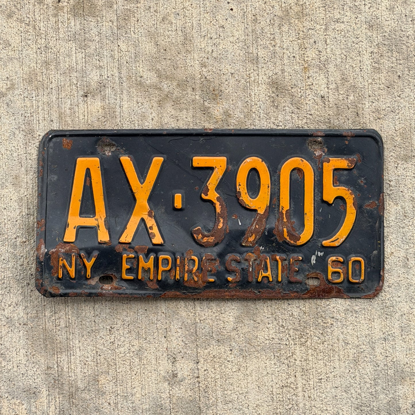 Photo of a 1960 New York License Plate Auto Tag Garage Decor Vintage AX 3905 with original patina