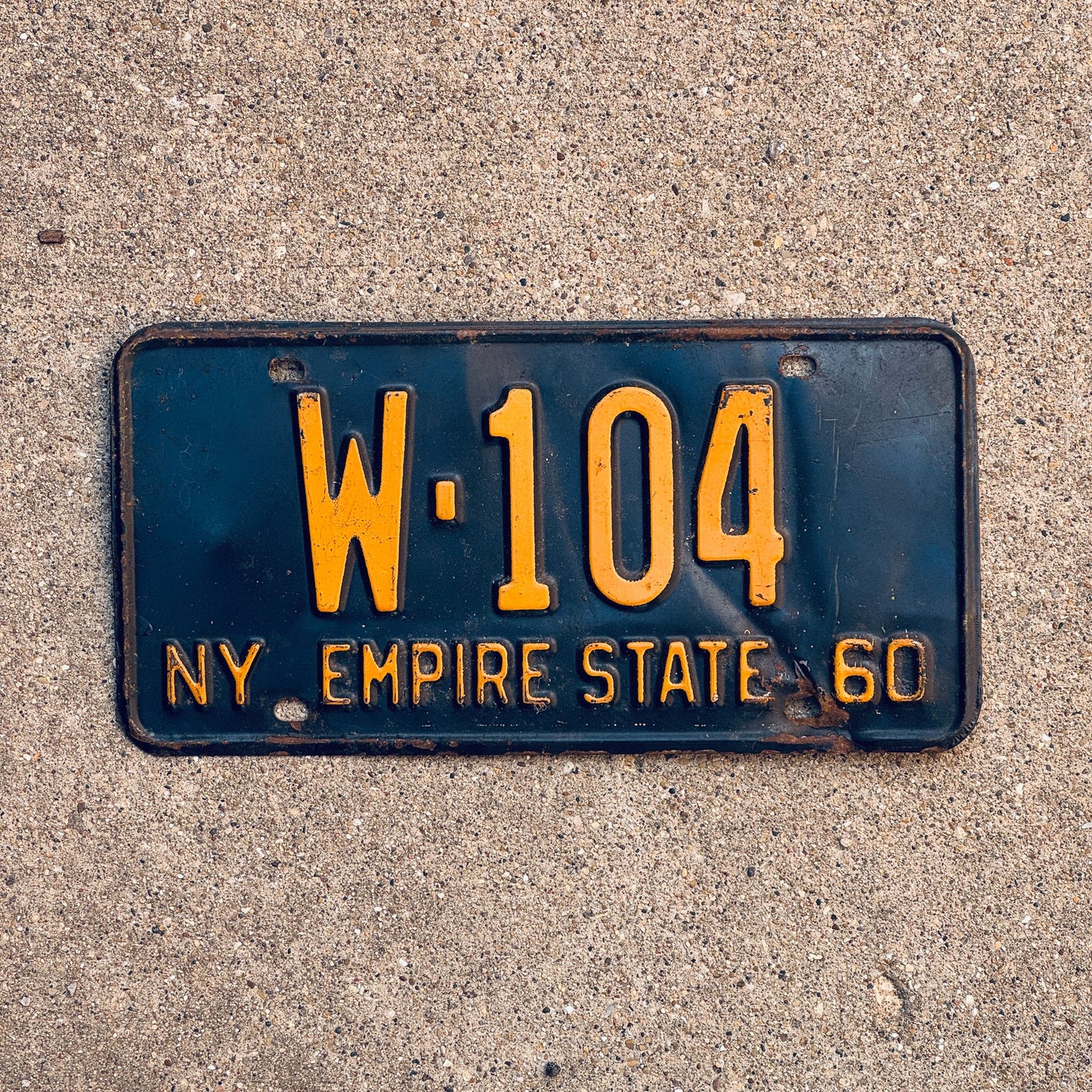 Photo of a 1960 New York License Plate Auto Tag Garage Decor Vintage W 104