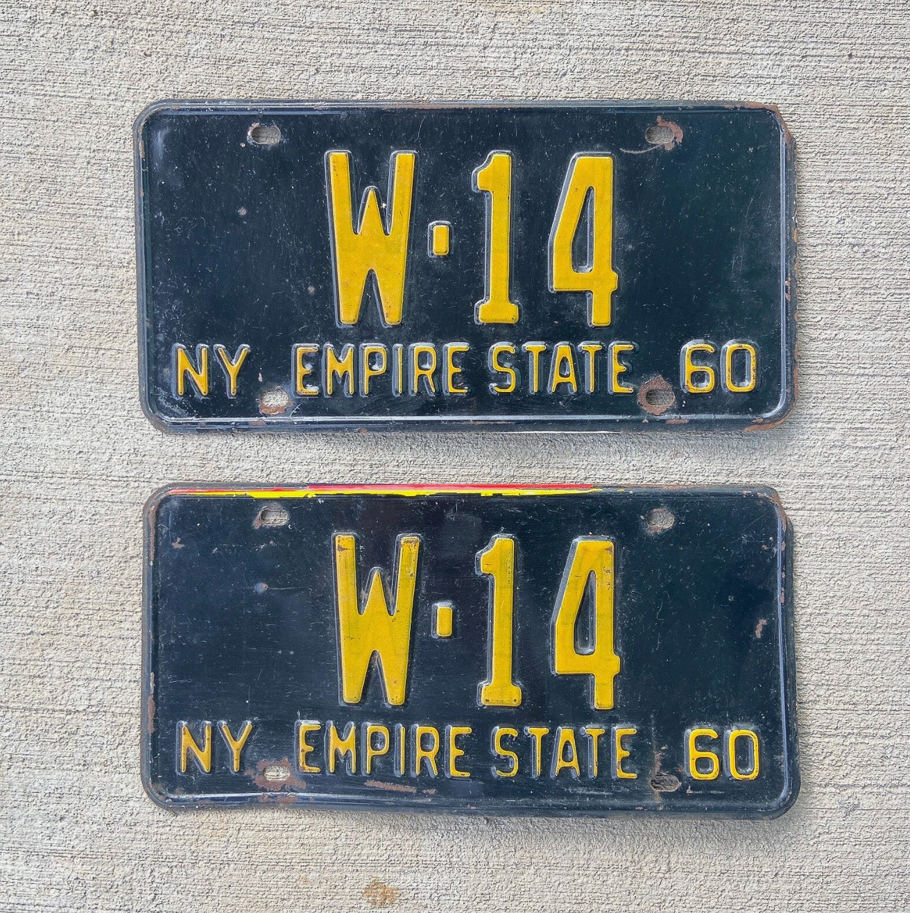 Photo of a 1960 New York License Plate Pair Auto Tag Garage Decor Vintage Low Number W 14 with original patina