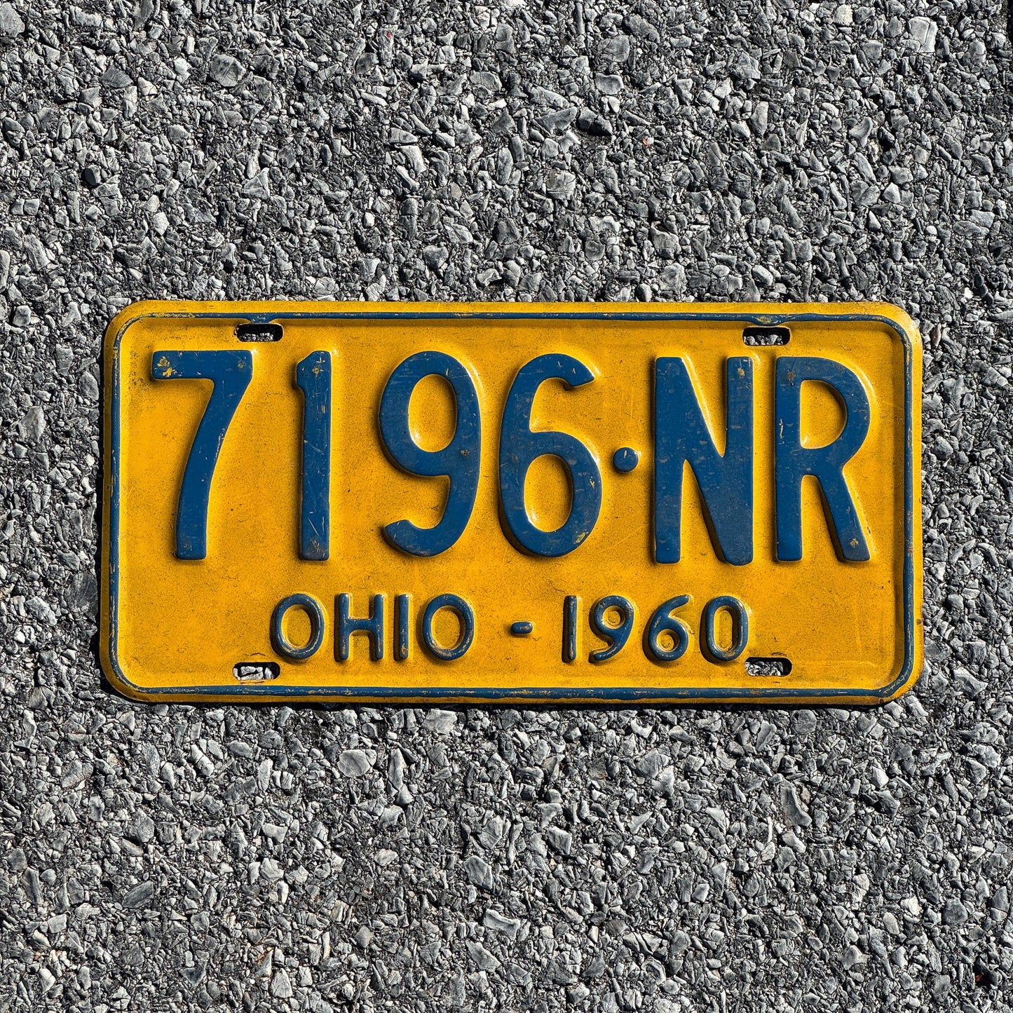 Photo of a 1960 Ohio License Plate Auto Tag Garage Decor Vintage 7196 NR