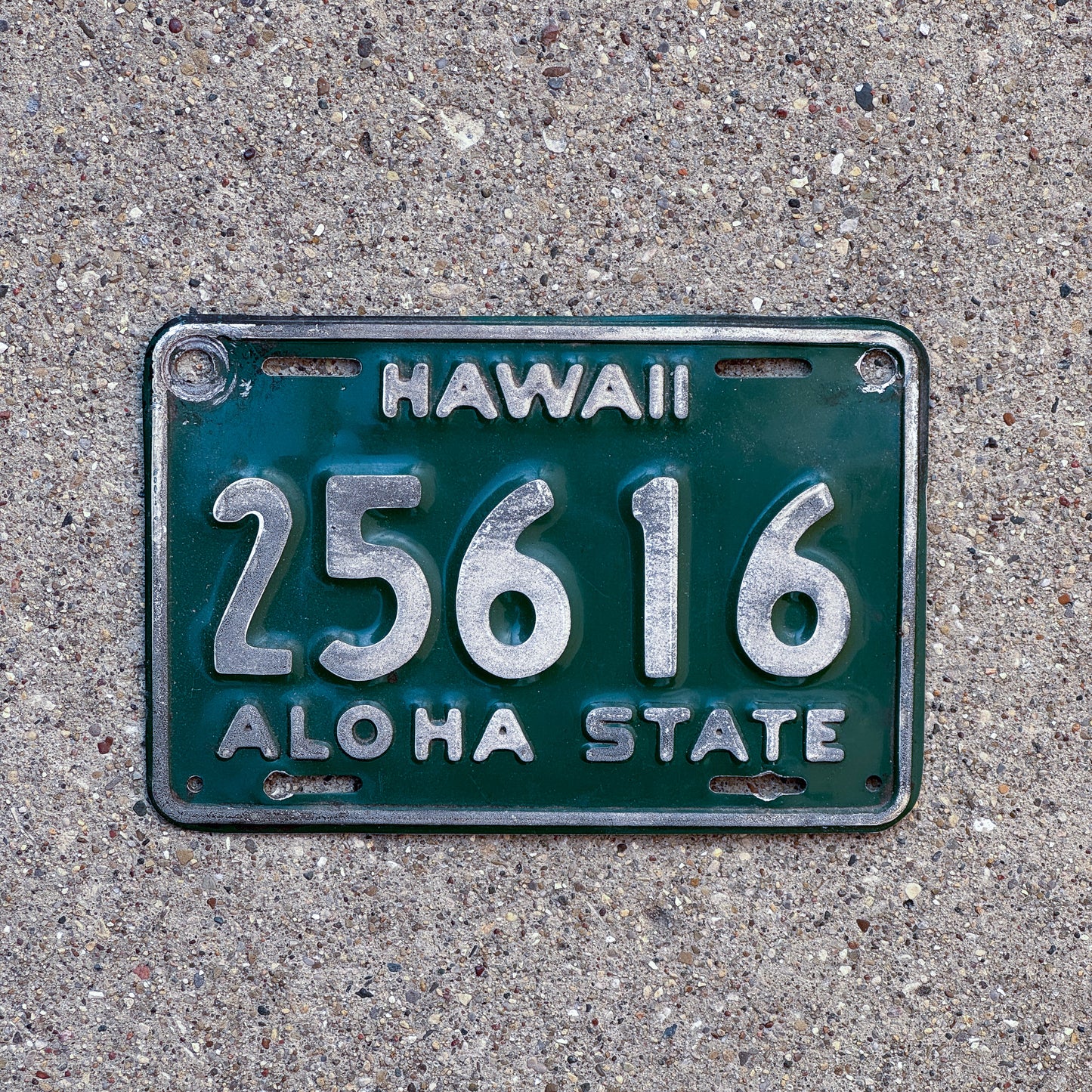 Photo of a 1961 Hawaii Motorcycle License Plate Auto Tag Garage Decor Vintage 25616 with original patina