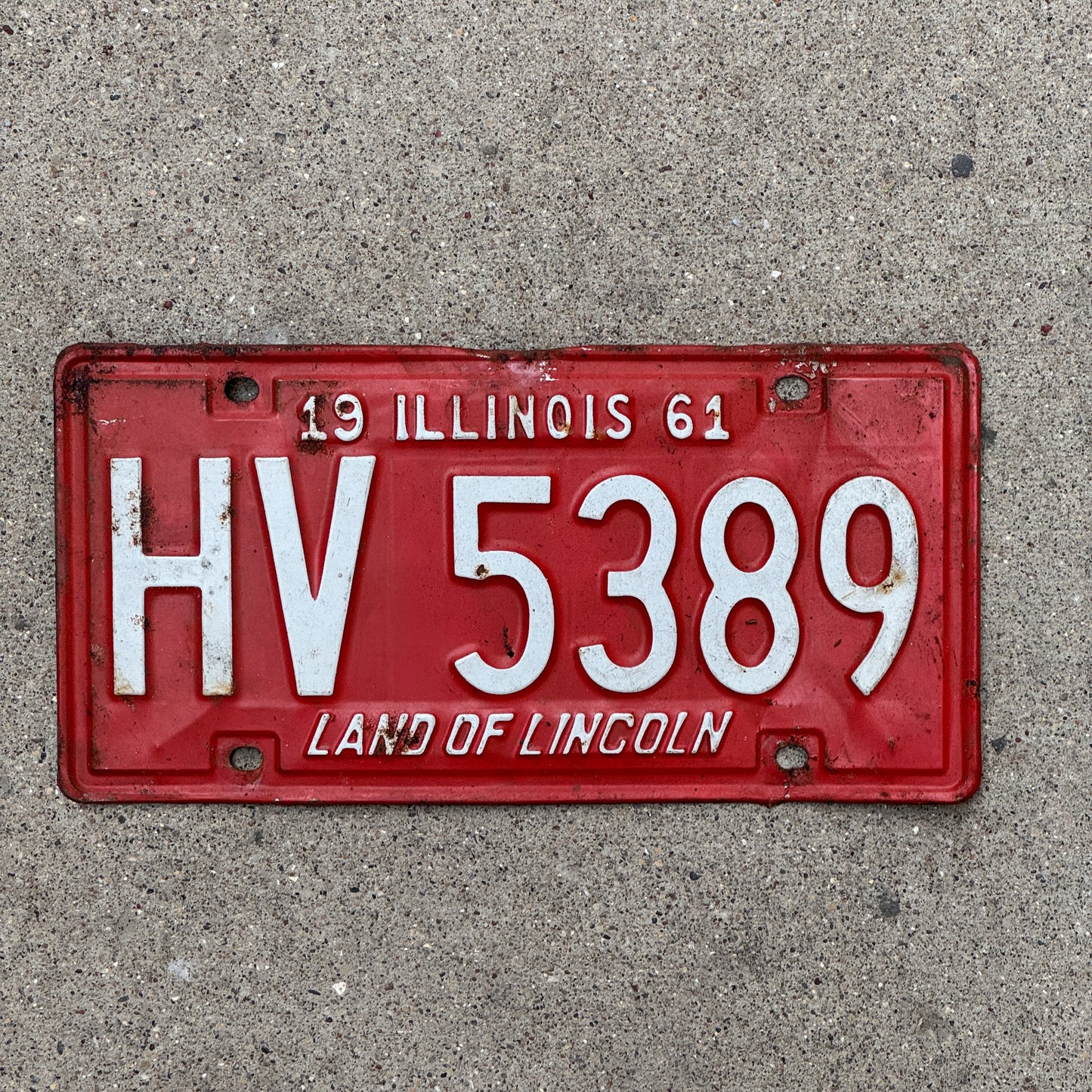 Photo of a 1961 Illinois License Plate Auto Tag Garage Decor Vintage HV 5389 with original patina