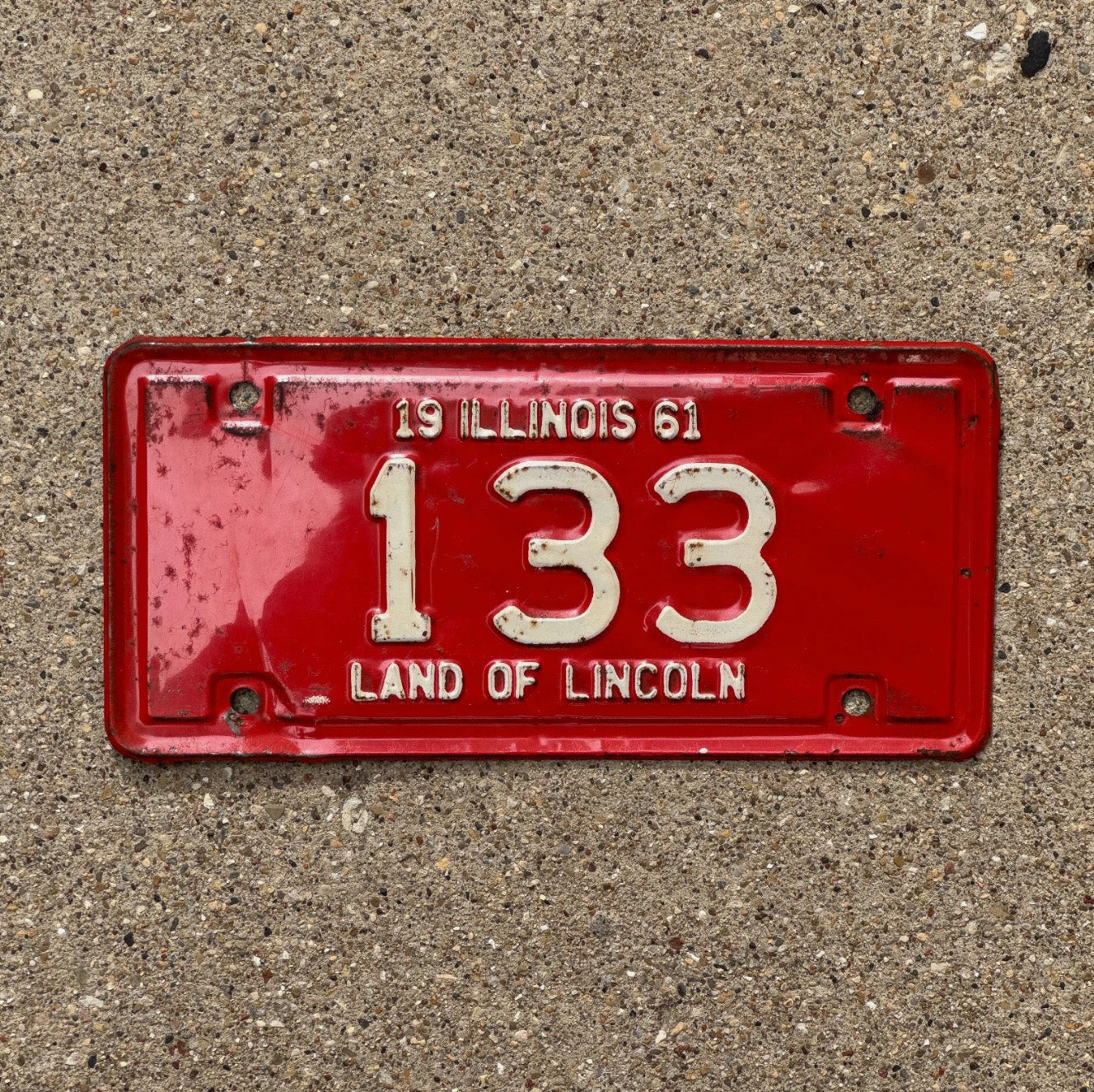 Photo of a 1961 Illinois Motorcycle License Plate Auto Tag Garage Decor Vintage Low Number Three Digit 133 with original patina