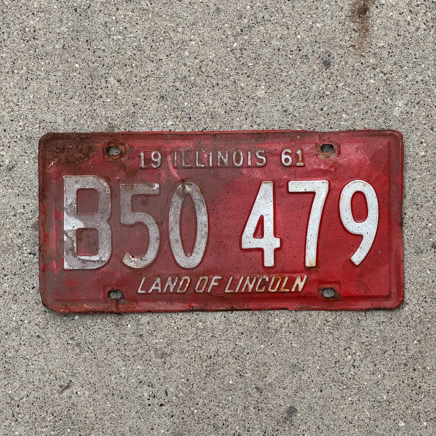 Photo of a 1961 Illinois Truck License Plate Auto Tag 1 Vintage Garage B 50 479 with original patina