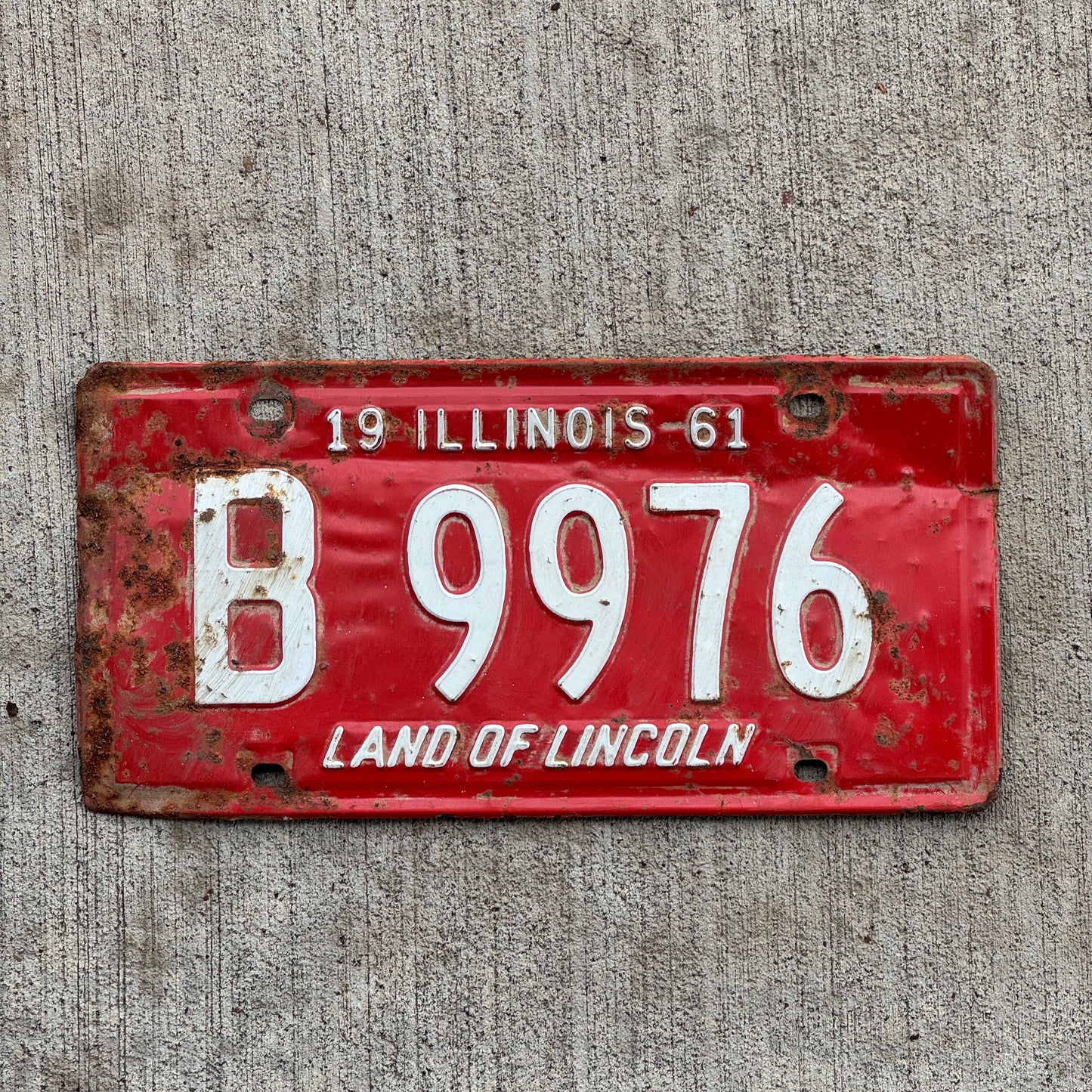 Photo of a 1961 Illinois Truck License Plate Auto Tag Garage Decor Vintage B 9976 with original patina