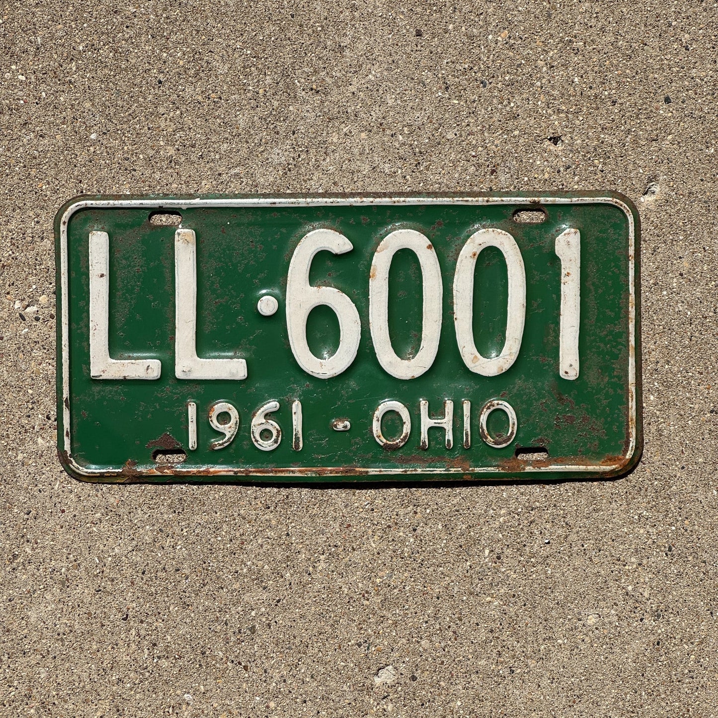 Photo of a 1961 Ohio License Plate Auto Tag Garage Decor Vintage LL 6001