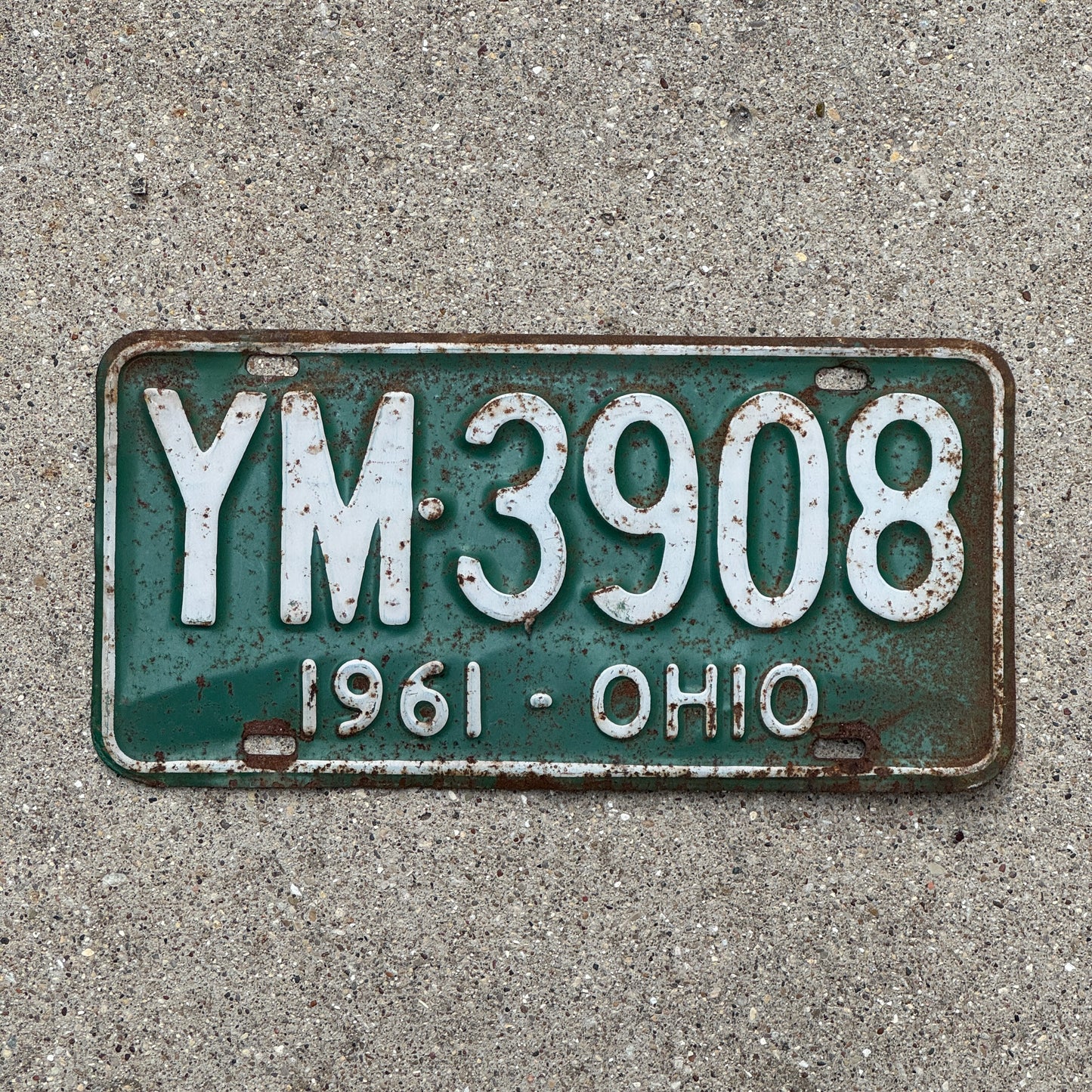 Photo of a 1961 Ohio License Plate Auto Tag Garage Decor Vintage YM 3908 with original patina