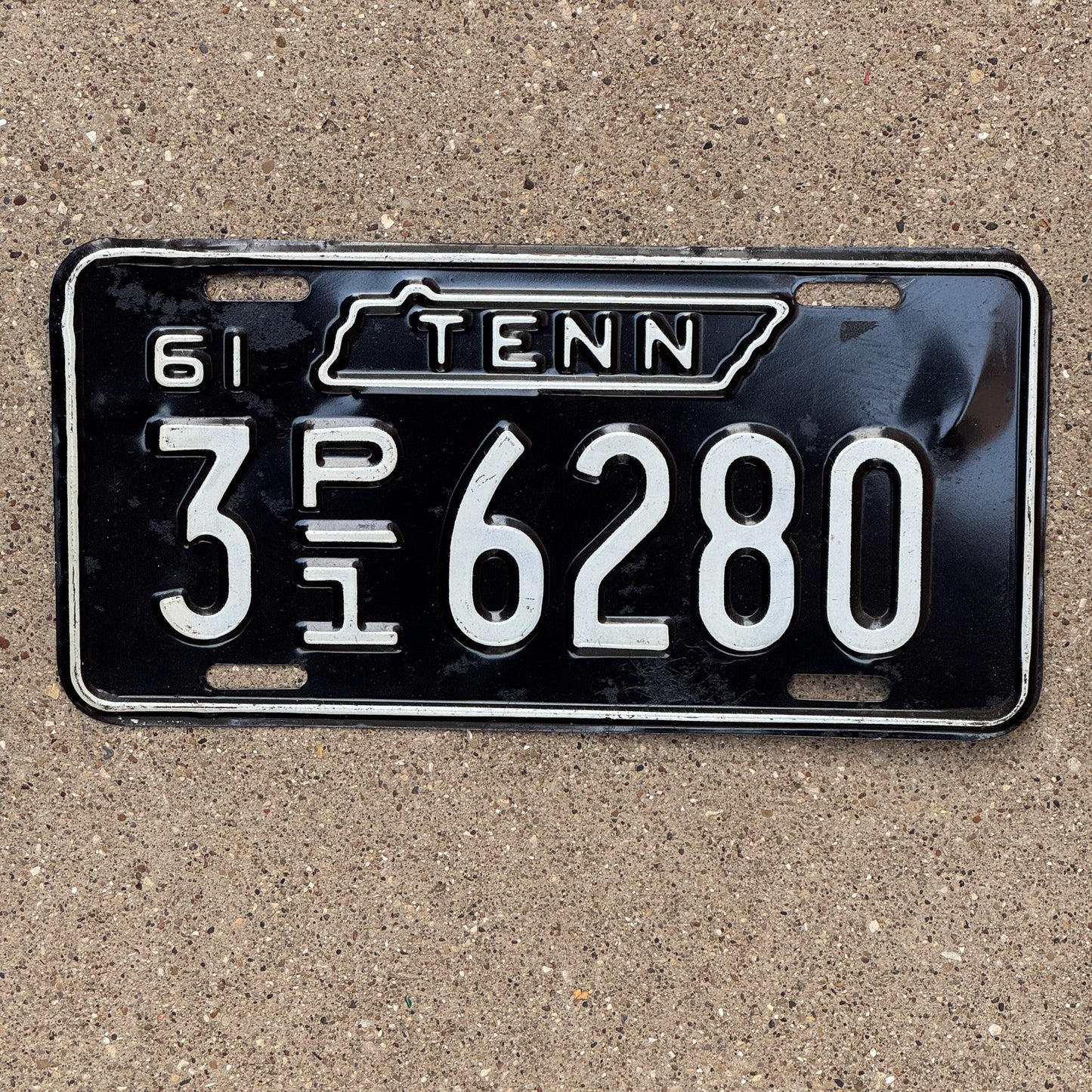 Photo of a 1961 Tennessee Truck License Plate Auto Tag Garage Decor Vintage 3 P1 6280