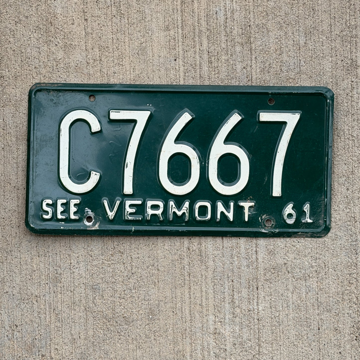 Photo of a 1961 Vermont License Plate Auto Tag Garage Decor Vintage C 7667 with original patina