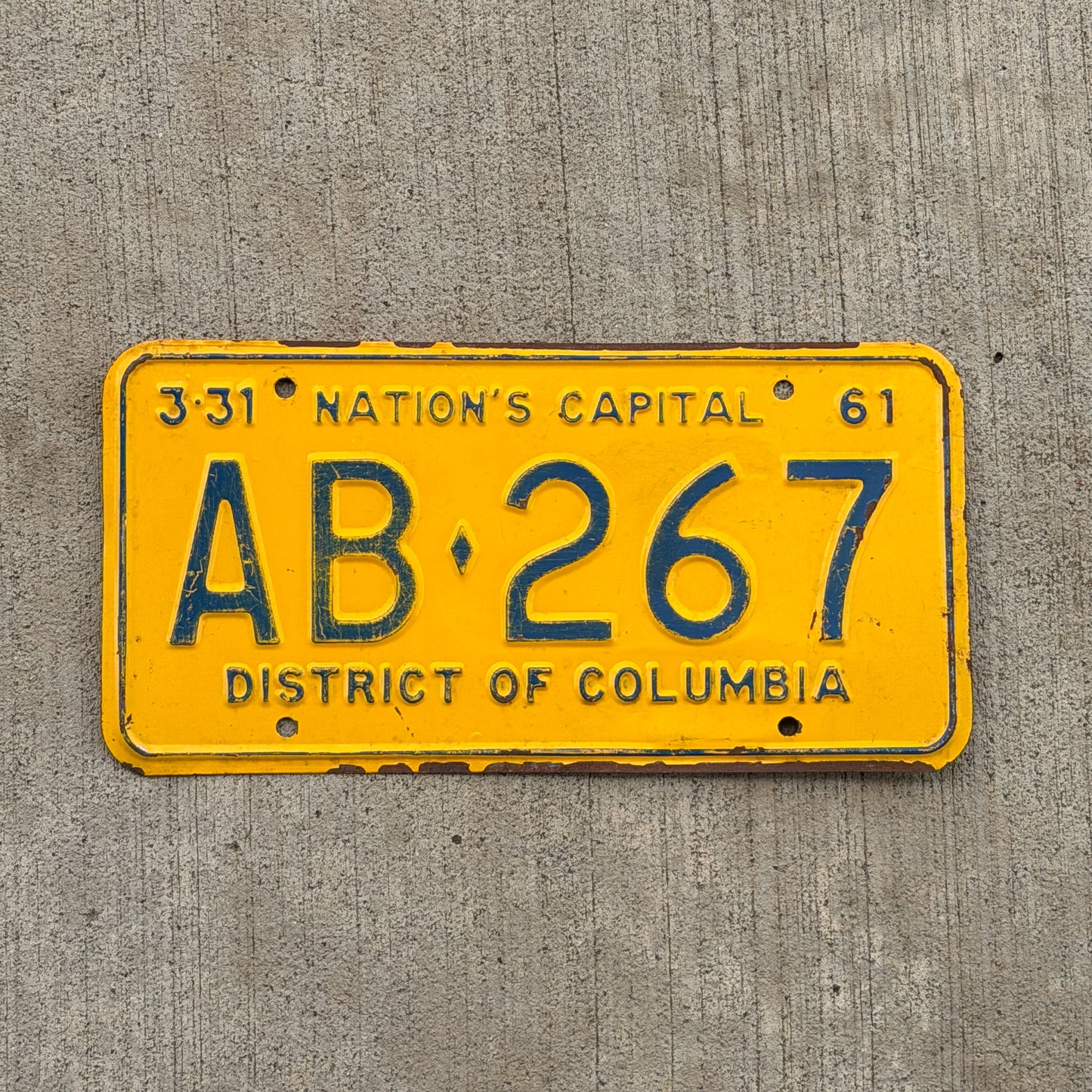 Photo of a 1961 Washington DC License Plate Auto Tag Garage Decor Vintage AB 267 with original patina