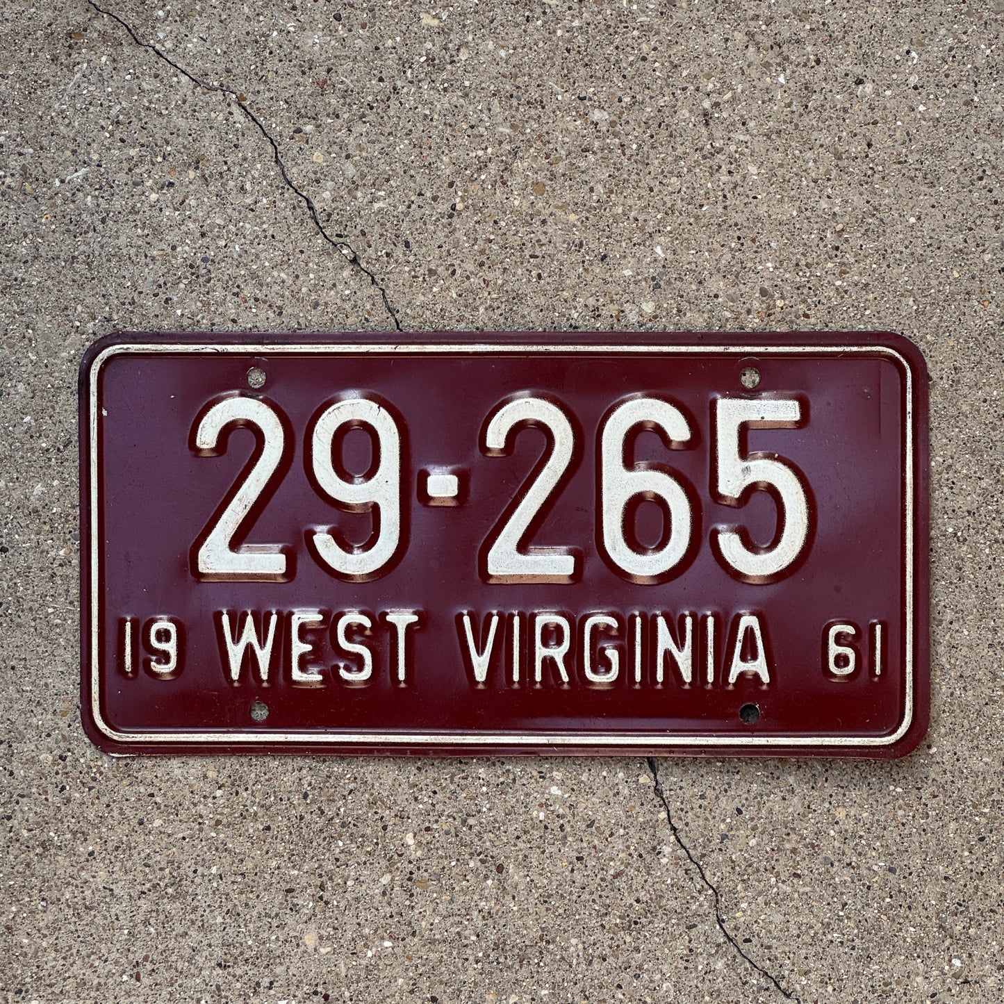Photo of a 1961 West Virginia License Plate Auto Tag Garage Decor Vintage 29 265 with original patina