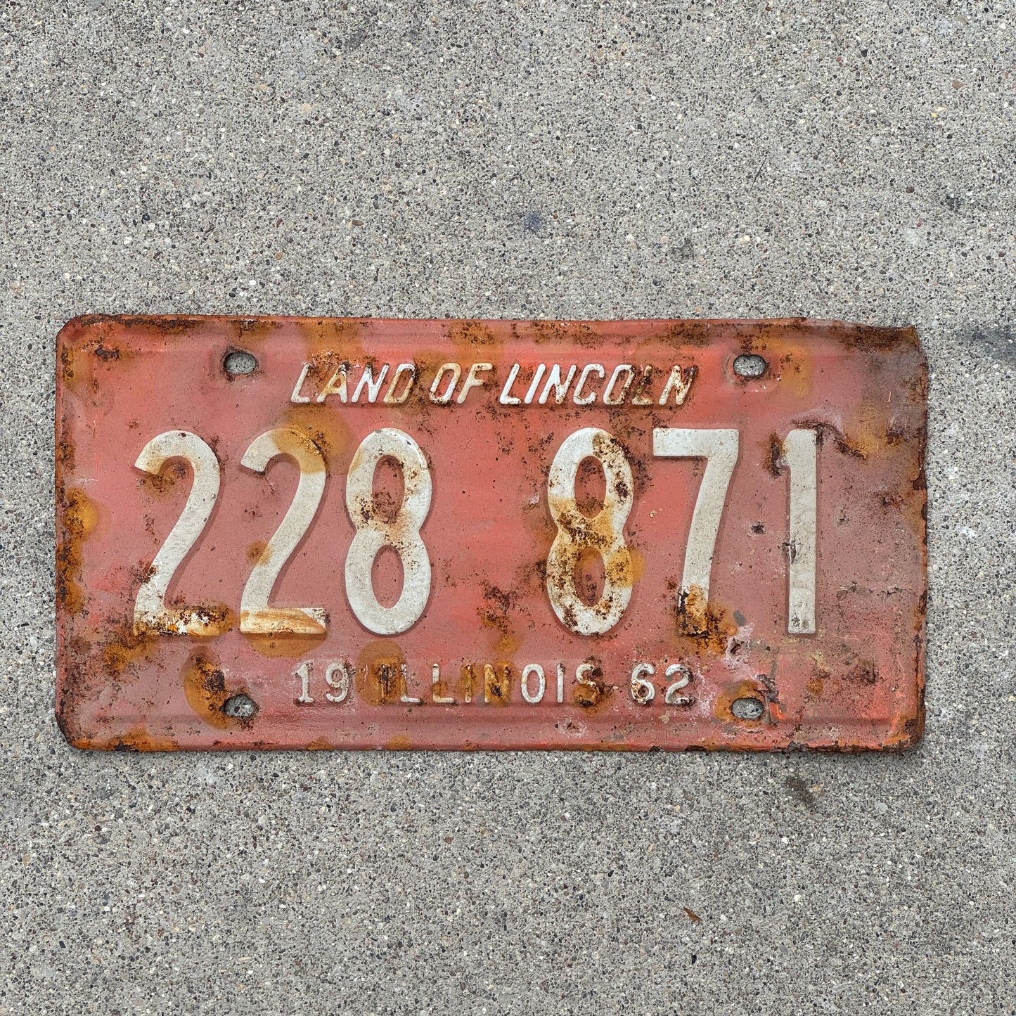 Photo of a 1962 Illinois License Plate Auto Tag 1 Vintage Garage 228 871 with original patina