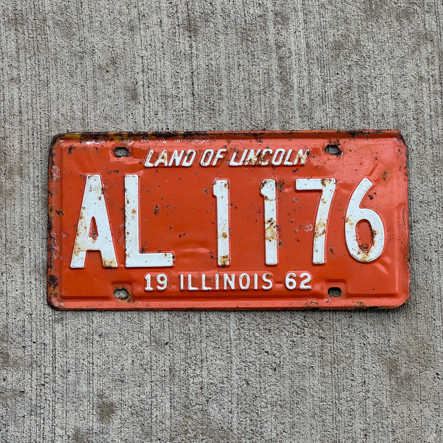 Photo of a 1962 Illinois License Plate Auto Tag 2 Vintage Garage AL 1176 with original patina