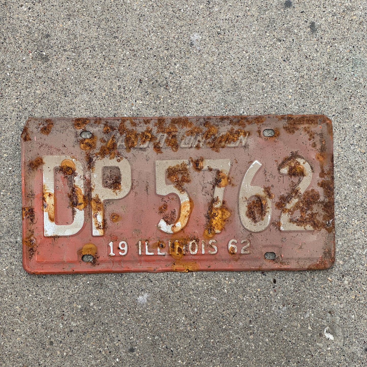 Photo of a 1962 Illinois License Plate Auto Tag 2 Vintage Garage DP 5762 with original patina