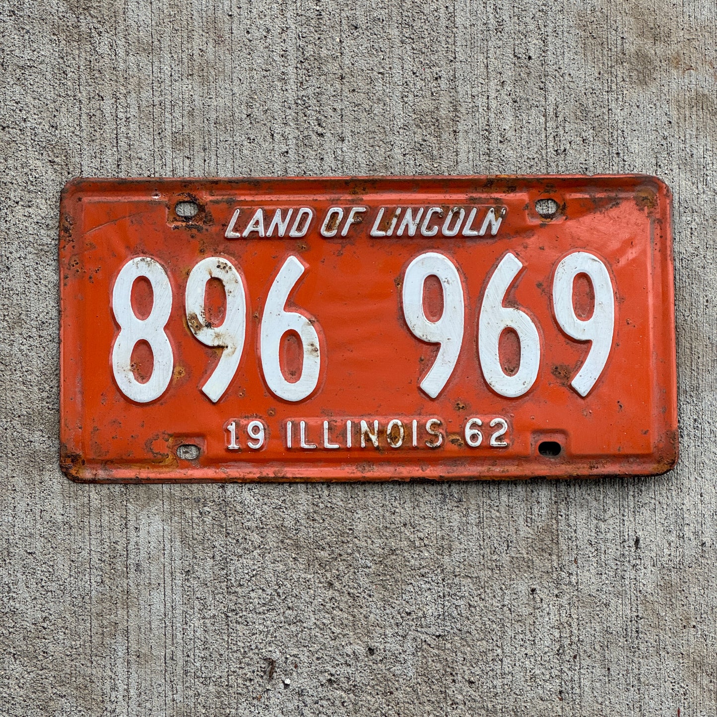 Photo of a 1962 Illinois License Plate Auto Tag Garage Decor Vintage 896 969 with original patina