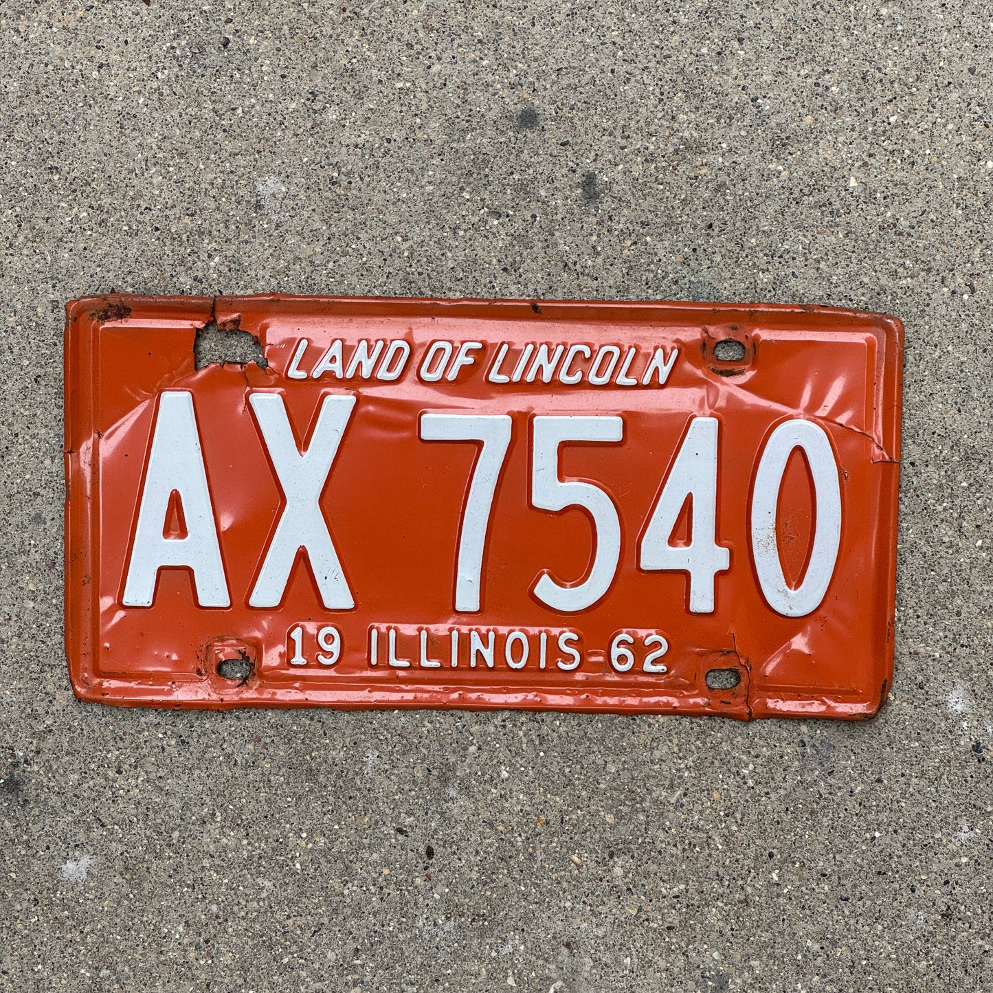 Photo of a 1962 Illinois License Plate Auto Tag Garage Decor Vintage AX 7540 with original patina