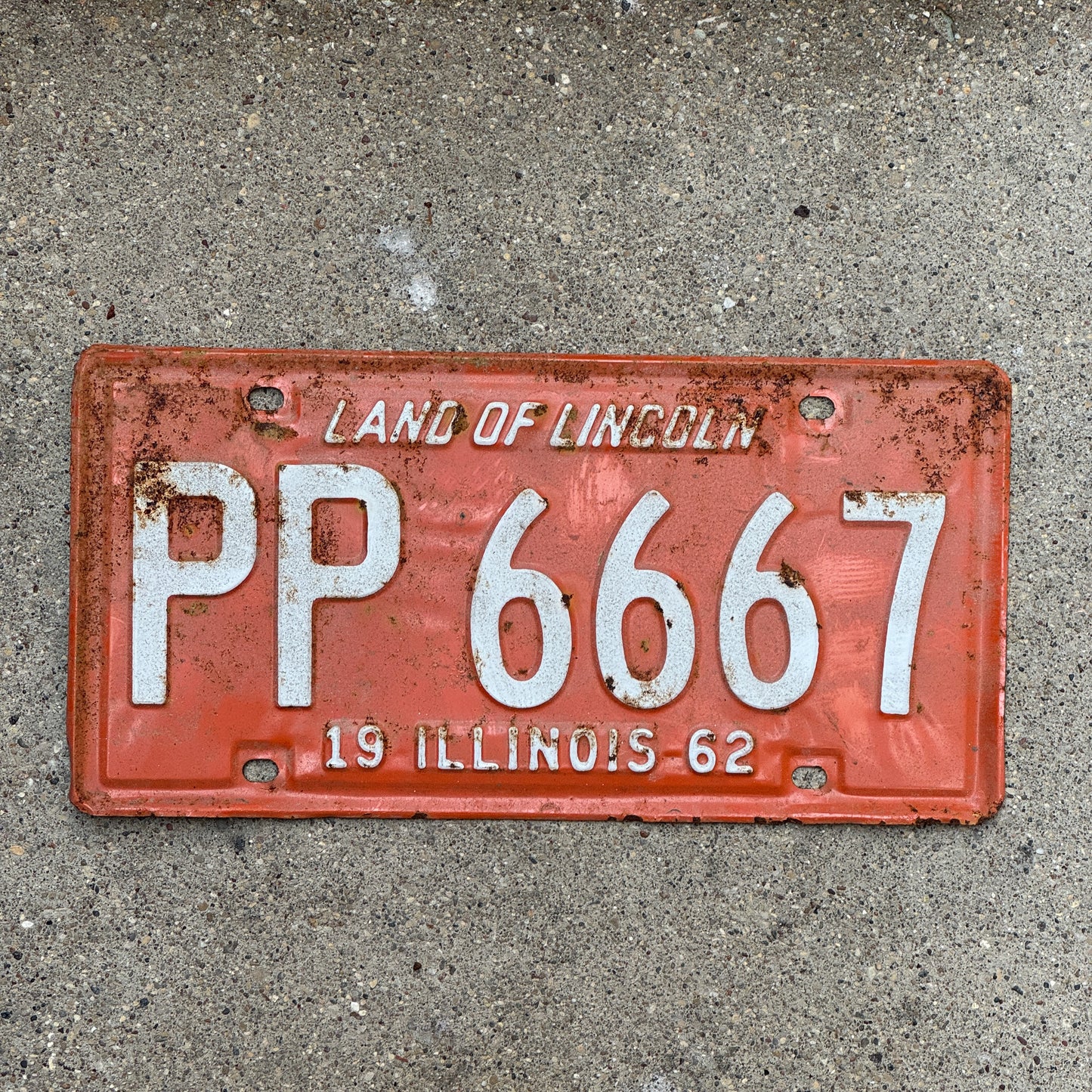Photo of a 1962 Illinois License Plate Auto Tag Garage Decor Vintage Devil Evil 666 Repeat Repeating PP 6667 with original patina