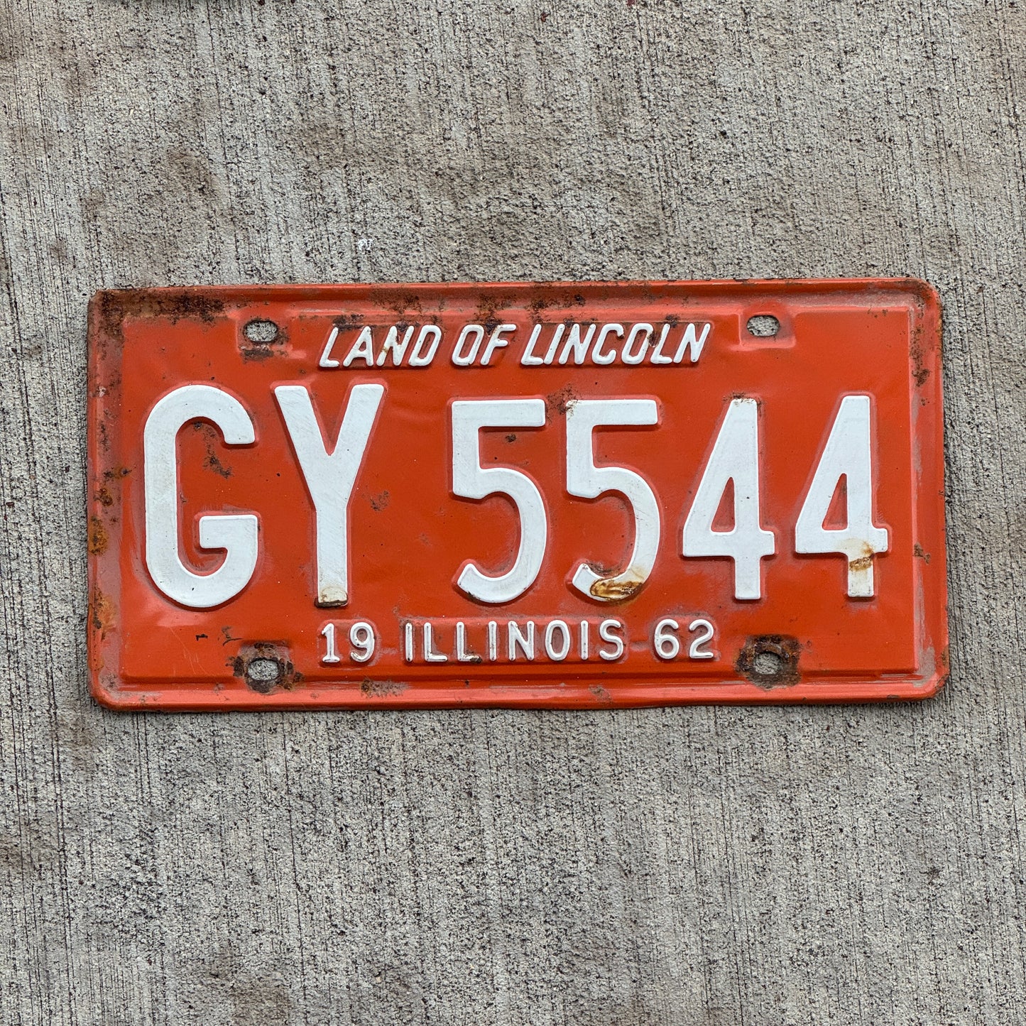 Photo of a 1962 Illinois License Plate Auto Tag Garage Decor Vintage GY 5544 with original patina